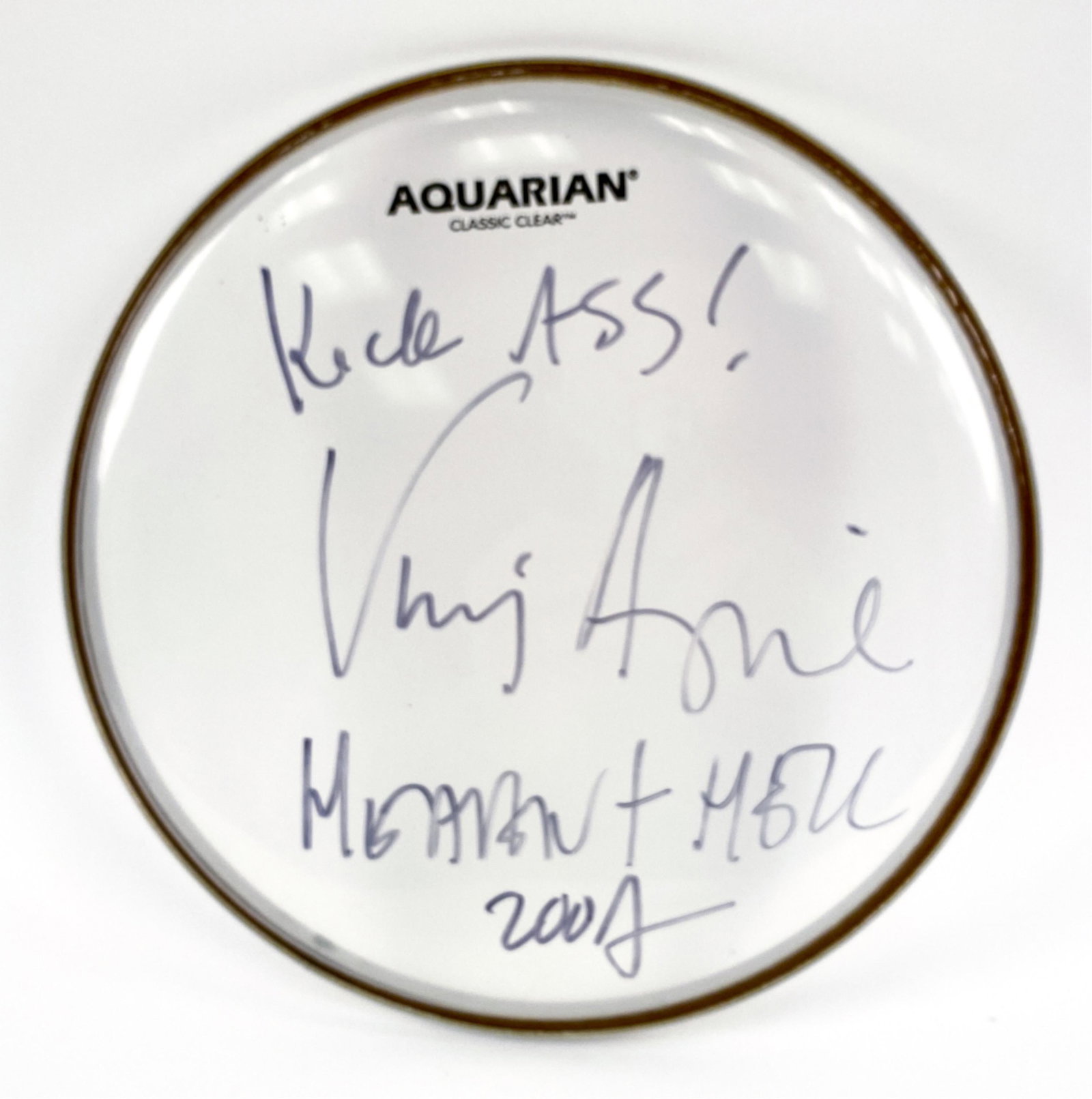 VINNY APPICE SIGNED DRUM HEAD: Aquarian Classic clear drum head. Bold inscription and date. Dimensions: Dia. 10.5" Condition: Marker slightly faded at parts.