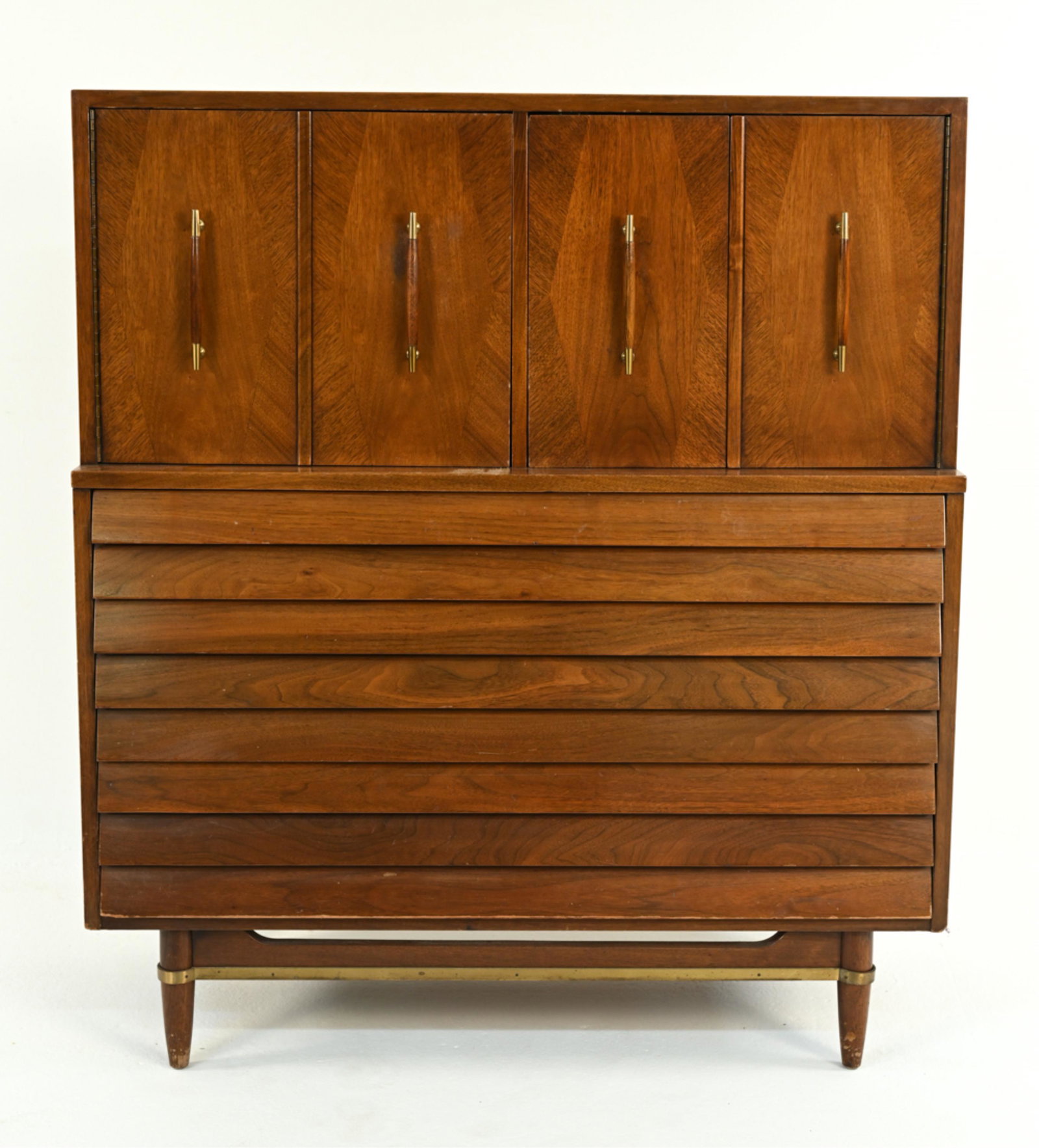AMERICAN OF MARTINSVILLE MID-CENTURY TALL DRESSER: Marked inside pull-out drawer in upper cabinet. Dovetailed drawer joints. Dimensions: H 49.75" x W 42" x D 18.75" Condition: Wear consistent with age and use including finish wear, area of scraping wh