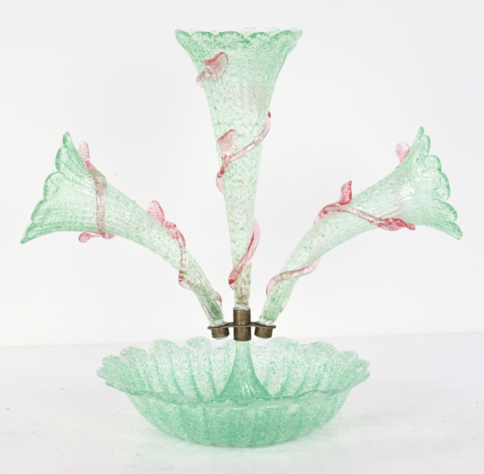 VENETIAN OVERSHOT GLASS EPERGNE: Studio glass epergne with light green overshot, pink vine wrap and lampwork leaves. Apparently unsigned, c. 20th Century. Dimensions: H 16" x W 17" x D 11" Condition: Small crack to central vase; a fe