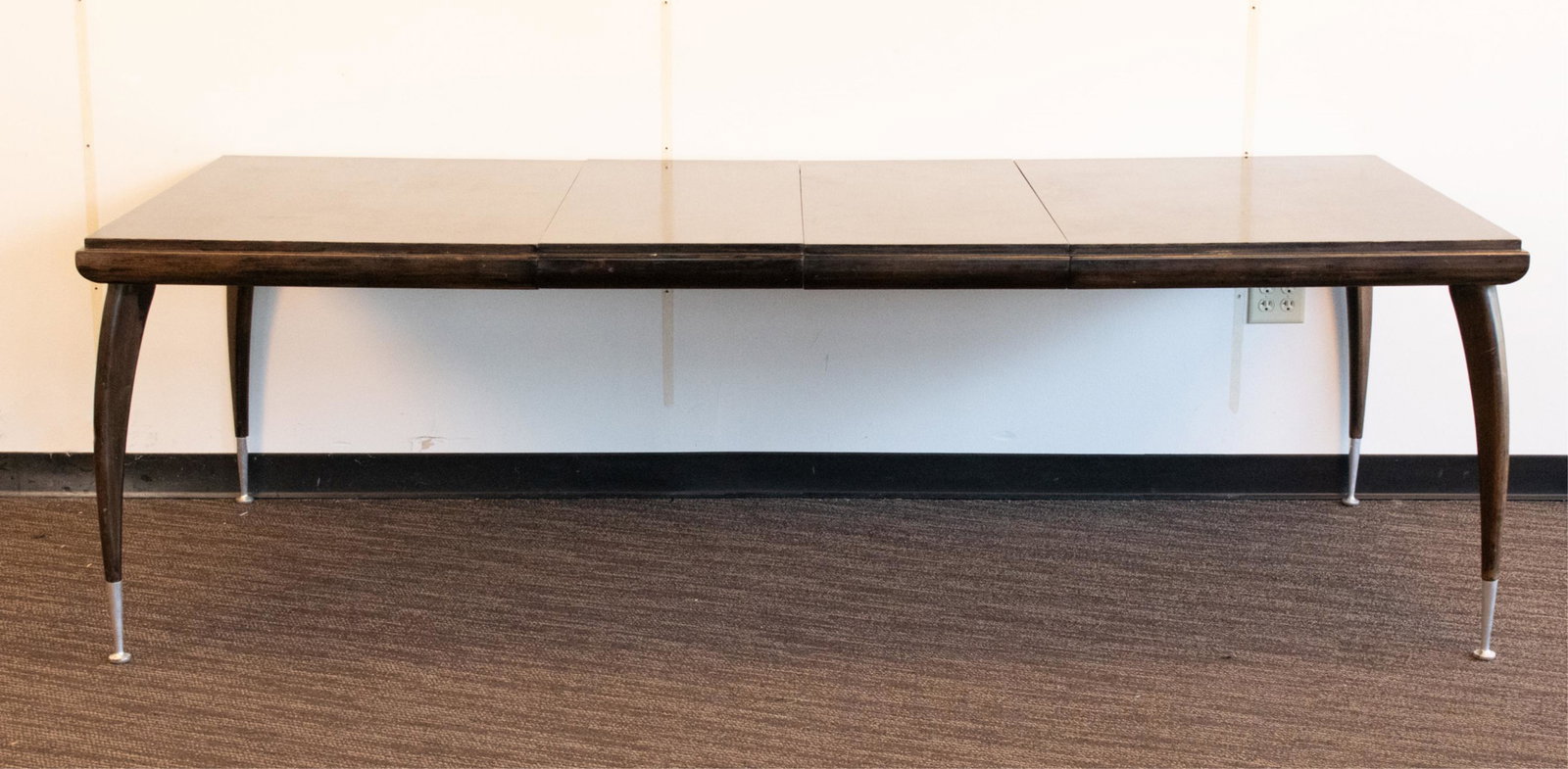 ITALIAN SCULPTURAL MID-CENTURY DINING TABLE: No apparent labels. Including (2) 17.5" leaves. With tapered aluminum leg terminals. Dimensions: (Without leaves) H 30" x W 61" x D 41" Condition: Wear consistent with use including scratches, rubs, w