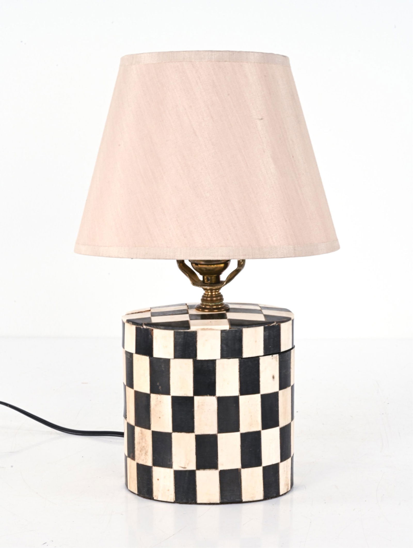 ATTR. KARL SPRINGER TESSELLATED BONE BOX LAMP: Petite checkered tessellated bone box, mounted as a table lamp. Attributed to Karl Springer c. 1960's. Dimensions: (With shade) H 13.5" x Dia. 7.75" Condition: Wiring not tested. Missing three pieces