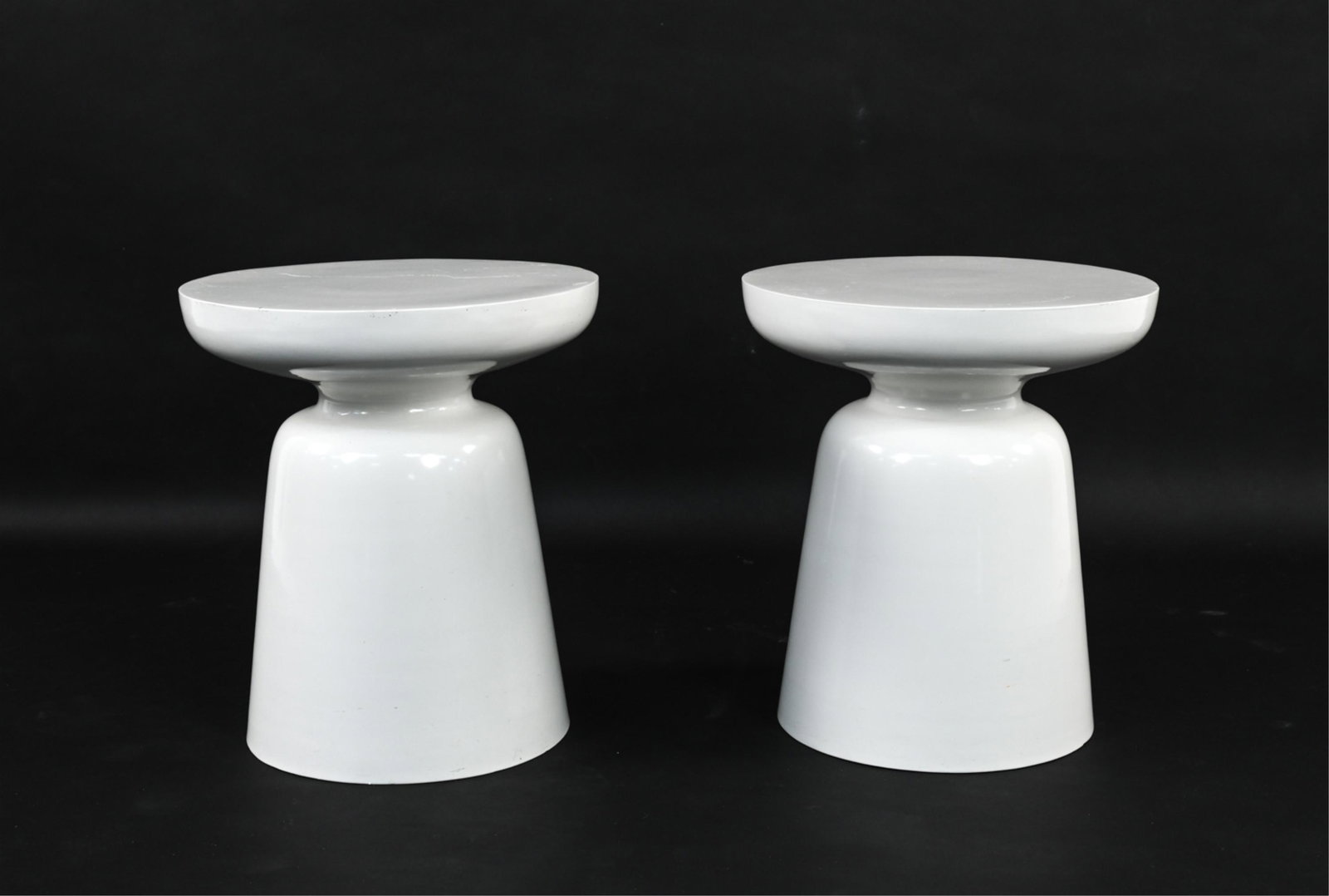 PAIR OF ENAMELED METAL ACCENT TABLES: Contemporary. Dimensions: H 16.75" x Dia. 14.75" Condition: A few nicks and scratches to enamel.