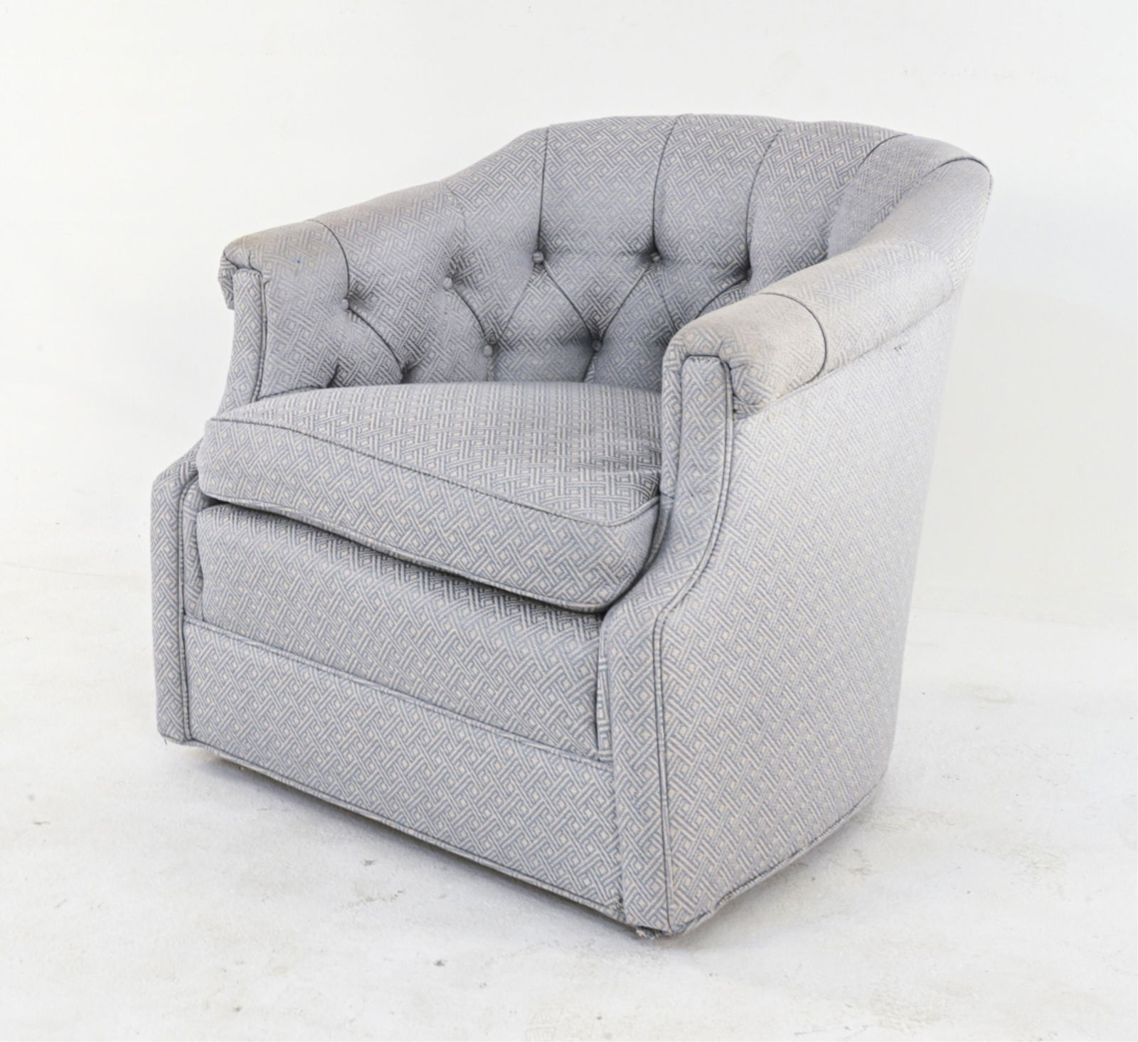 TUFTED BARREL-BACK ROLLING SWIVEL CHAIR: Apparently unsigned, c. Late 20th Century. Dimensions: H 28" x W 31" x D 30" x SH 18" Condition: Fabric with one small tear to lower front-left corner, a few pulled threads. Overall light wear consist