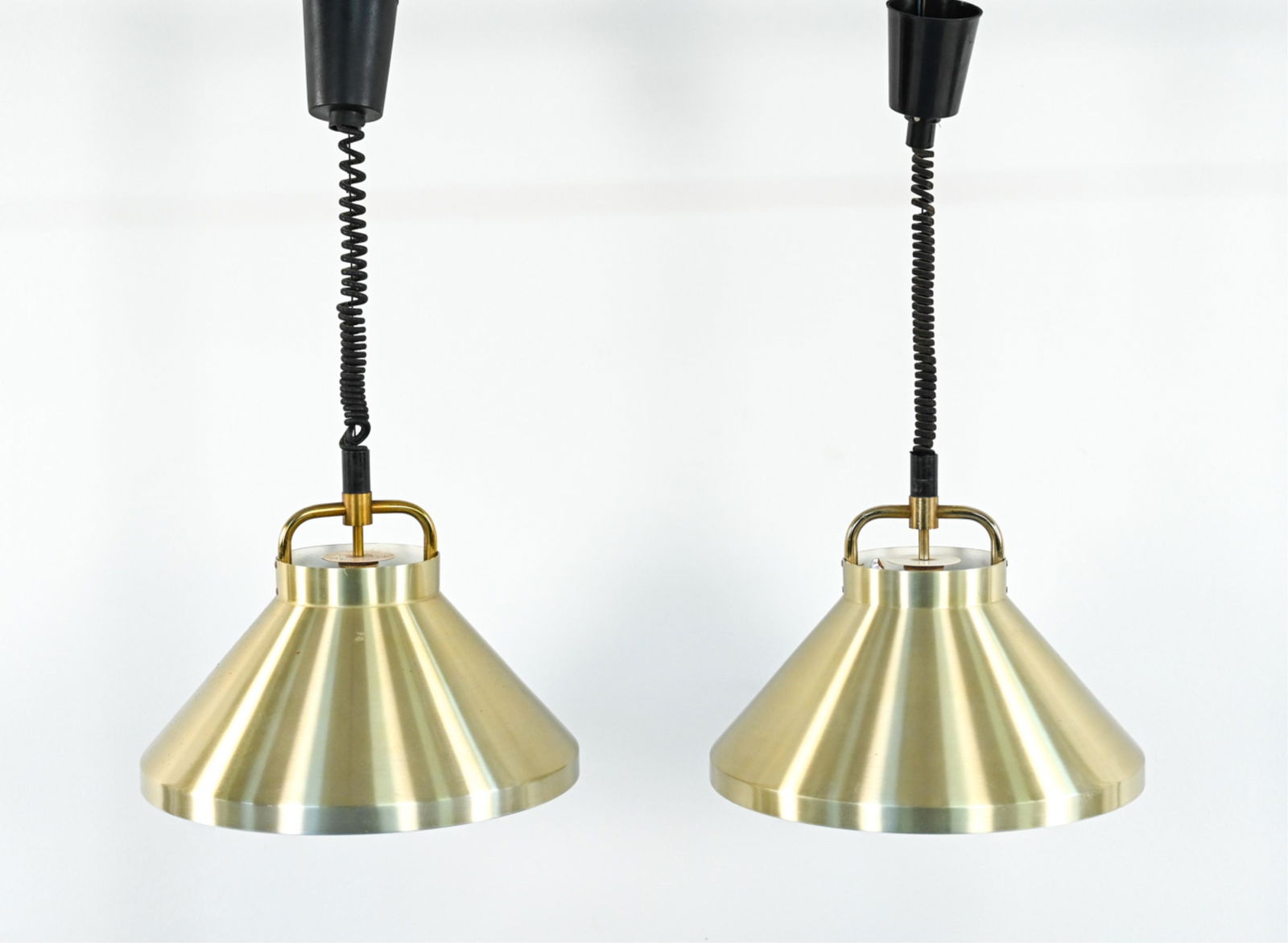 PAIR OF JO HAMMERBORG FOG & MORUP "TAROK" PENDANTS: Pair of Danish mid-century brass model "Tarok" pendant lights designed by Jo Hammerborg for Fog & Morup. Dimensions: (Pendant) H 13.25" x Dia. 16.5" Condition: Untested; may require rewiring. Scattere