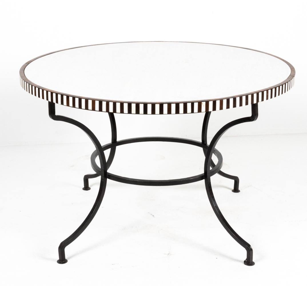 CONTEMPORARY STONE TOP DINING TABLE W/ BONE INLAY: Contemporary round iron base dining table with gray stone top and bone and wood inlaid edge. Apparently unmarked. Dimensions: H 30" x Dia. 47.5" Condition: Few light surface scratches to top.