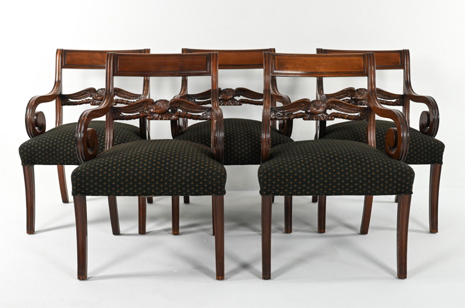 (5) CLASSICAL MAHOGANY EAGLE SLAT BACK ARMCHAIRS: Set of (5) mahogany armchairs in the style of Duncan Phyfe, with ornate carved eagle-form slats. C. Mid- to Late 20th Century. From the storied Union and New Haven Trust Building, designed by Cross &