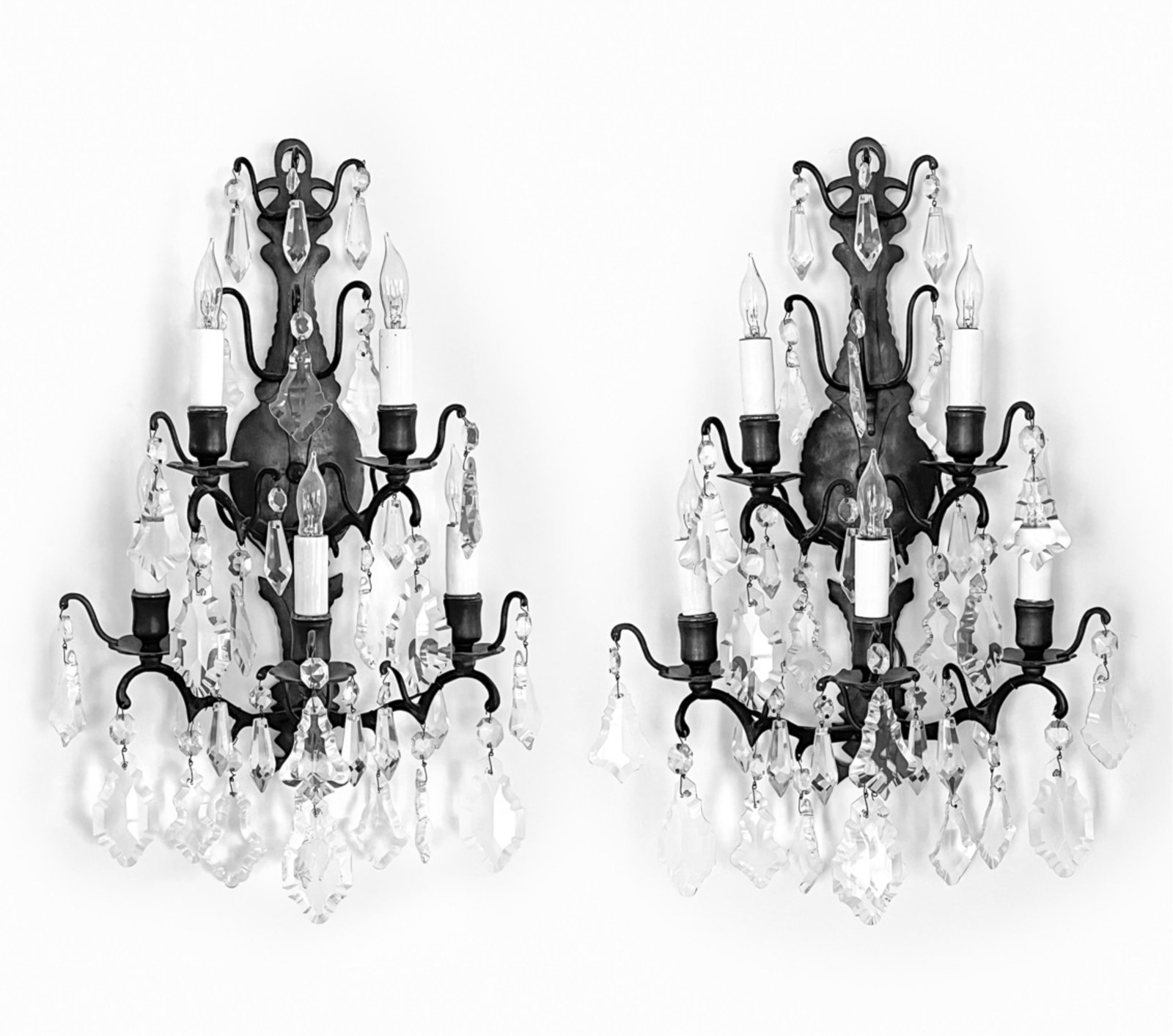 PAIR OF SCONCES: Pair of drop crystal sconces. Dimensions: H 21" x W 13" x D 9" Condition: Wear consistent with age and use. Missing (1) drop crystal.
