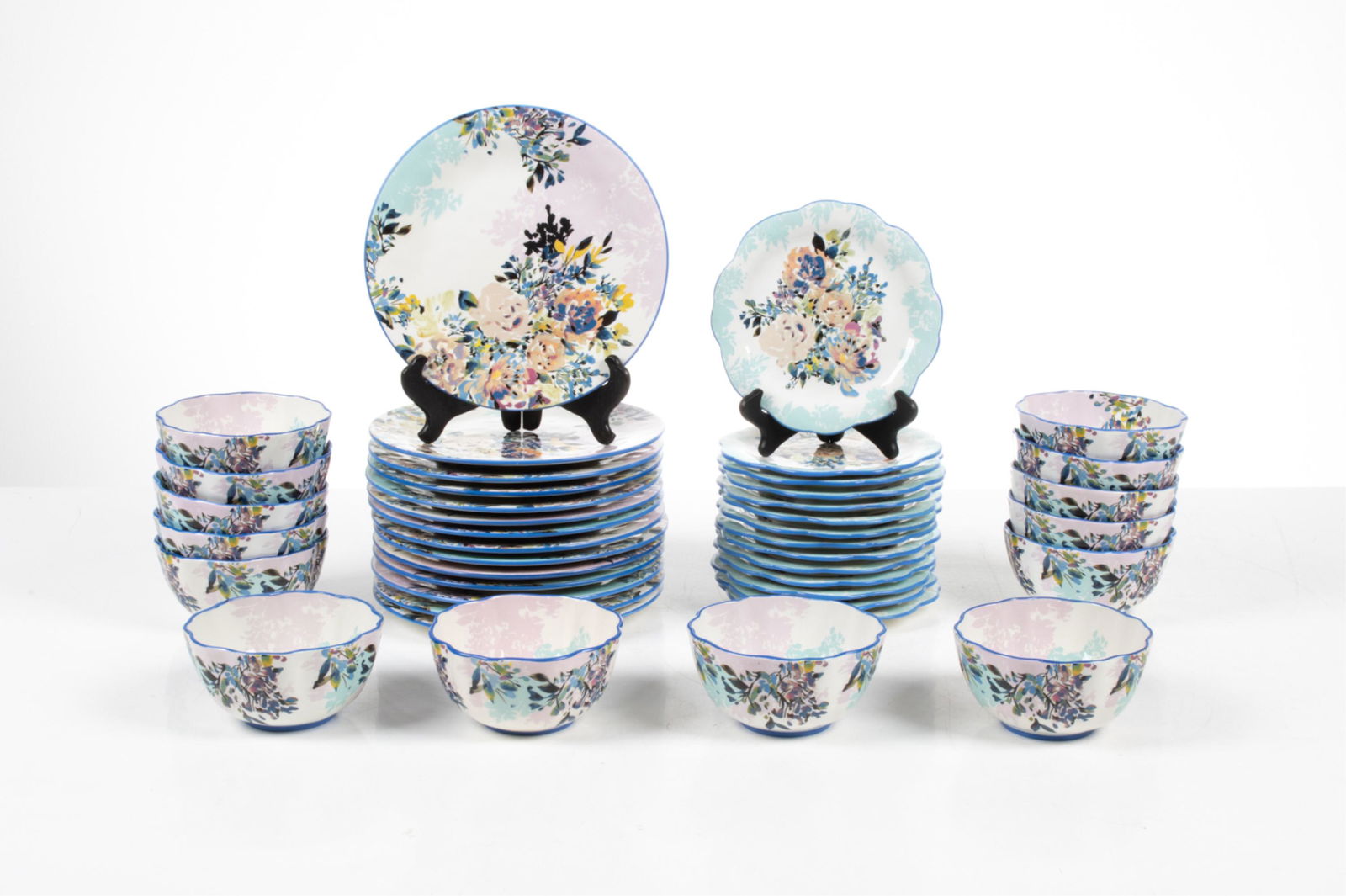 ANTHROPOLOGIE "GARDENSHIRE" CERAMIC DINNERWARE: Dishwasher and microwave safe. Including: (14) coupe cereal bowls, (14) salad plates, and (14) dinner plates.Dimensions: (Dinner plate) Dia. 10.75"Condition: Several pieces appear to be unused, with o
