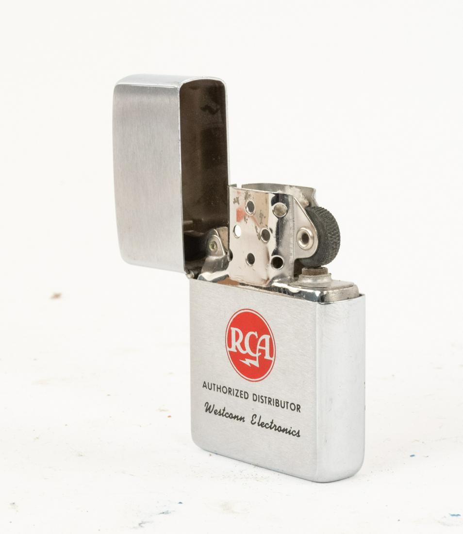 VINTAGE RCA MEATBALL ZIPPO LIGHTER NOS NIB: However modest, this is one of our favorite items in this auction. A meatball-era RCA logo Zippo lighter new in its original packaging. This particular example was inscribed to "WestConn Electronics".