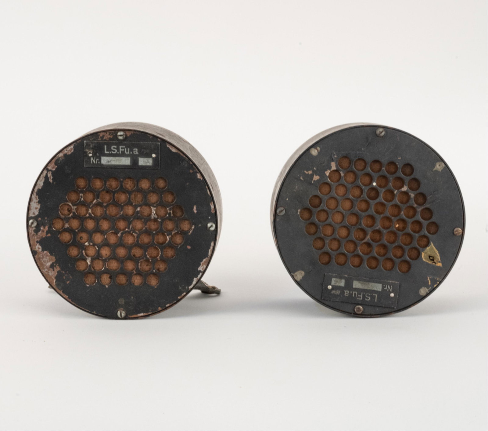 PAIR OF GERMAN STEEL MILITARY SPEAKERS: Inscribed LS.Fu.a. Great looking pair of unusual German military communication loudspeakers. Cylindrical design, steel construction with interesting bronze metallic grill cloth. Speakers have been tes
