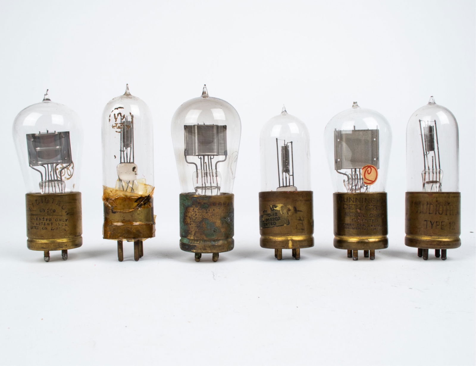 GROUPING OF (6) VERY EARLY BRASS BASED 4-PIN TUBES (1 of 17)