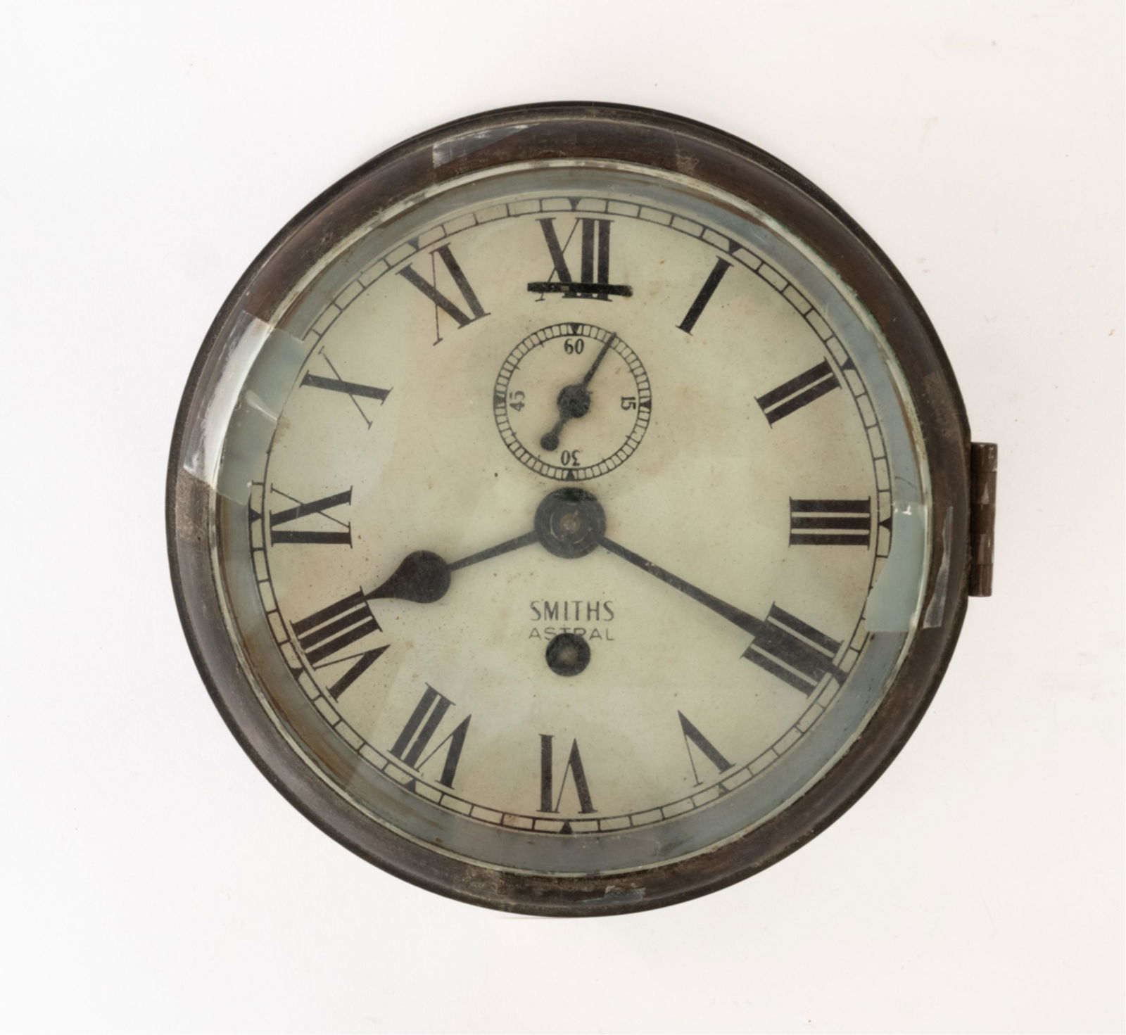 ANTIQUE SMITHS ASTRAL MARITIME BRIDGE CLOCK: Marked "Smiths Astral / Made in Great Britain" on dial. Dimensions: Dia. 8" x D 4" Condition: Not tested; movement not professionally inspected. Crystal possibly replaced. Great weathered patina; dist