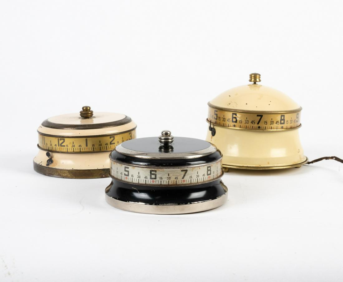 (3) 1940'S ENAMEL ROTARY OR TAPE MEASURE CLOCKS (1 of 9)
