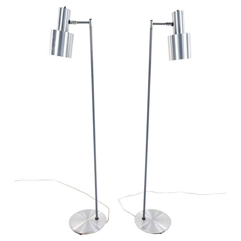 PAIR JO HAMMERBORG, FOG & MORUP "STUDIO" LAMPS: Pair of stylish Danish mid-century model "Studio" floor lamps in brushed aluminum, designed by Jo Hammerborg for Fog and Morup, c. 1960's. Dimensions: H 59" x W 11" x D 15.5" Condition: Wear consisten