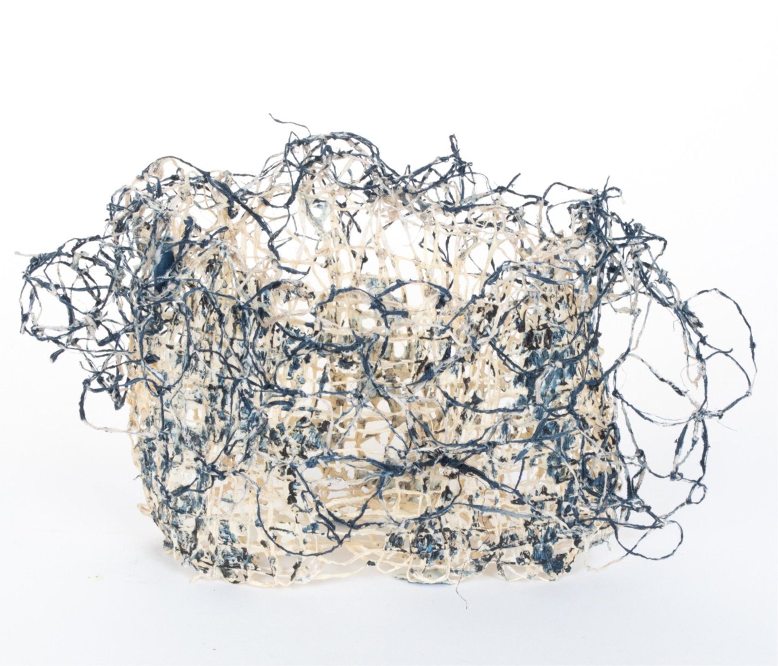 KIYOMI IWATA WOVEN SCULPTURE: Titled Kibiso II. Elongated basket form with blue pigment. Apparently unsigned. Originally purchased from Browngotta Arts for $3200. Dimensions: H 9" x W 16" x D 10"Condition: No apparent damage.