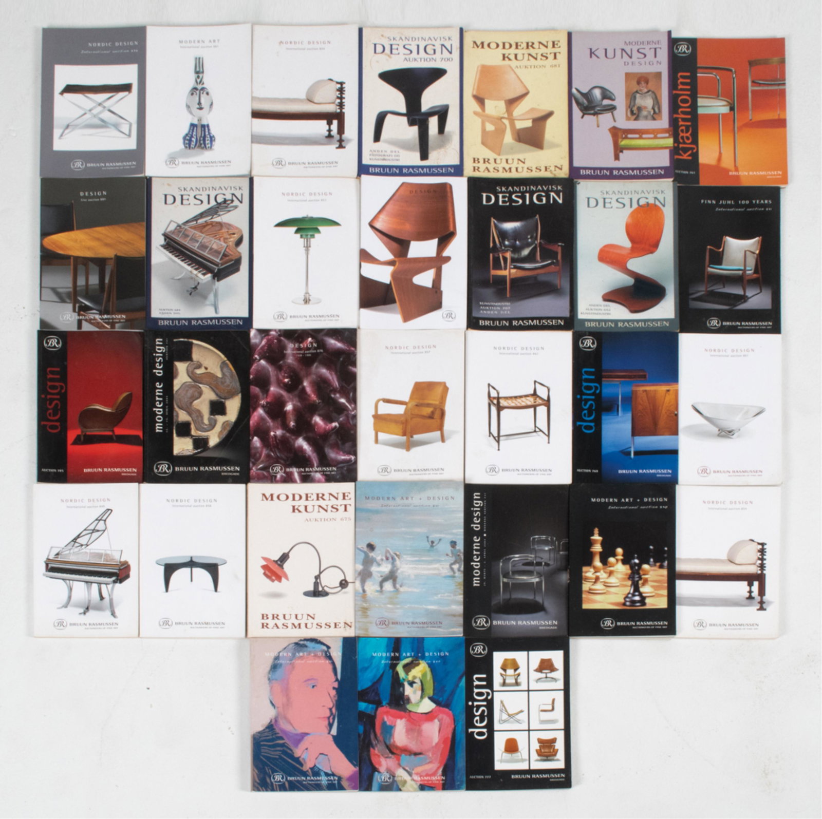GROUPING OF (31) BRUUN RASMUSSEN AUCTION CATALOGS: Specialists in Modern Art and Scandinavian Design. Dimensions: H 11" x W (total linear width) 14.5" x D 8" Condition: Some soiling to covers; general handling wear consistent with age. B074