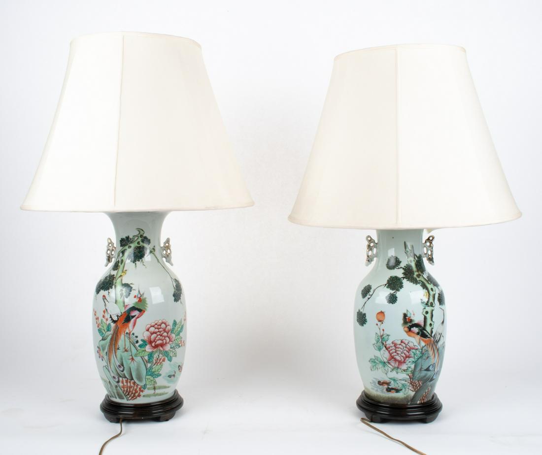 PAIR OF CHINESE FAMILLE VERTE URNS, AS LAMPS: A fine pair of Chinese famille verte porcelain urns with phoenix, peony, and heron motifs. Calligraphy writing to sides. Mounted as lamps. Slight celadon tinge to background. Dimensions: (Urn) H 16.75