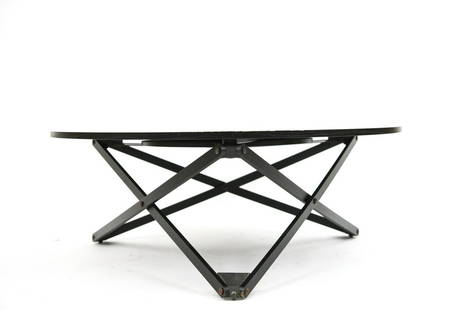 HERITAGE & WEBB SUBEYBAJA TABLE FOR SANTA & COLE: Ebony finish round wood coffee- or breakfast table featuring adjustable height scissor-base. Designed by Robert Heritage and Roger Webb for Santa & Cole. Dimensions: Full H 28" (Lowest H 14.5") x Dia.