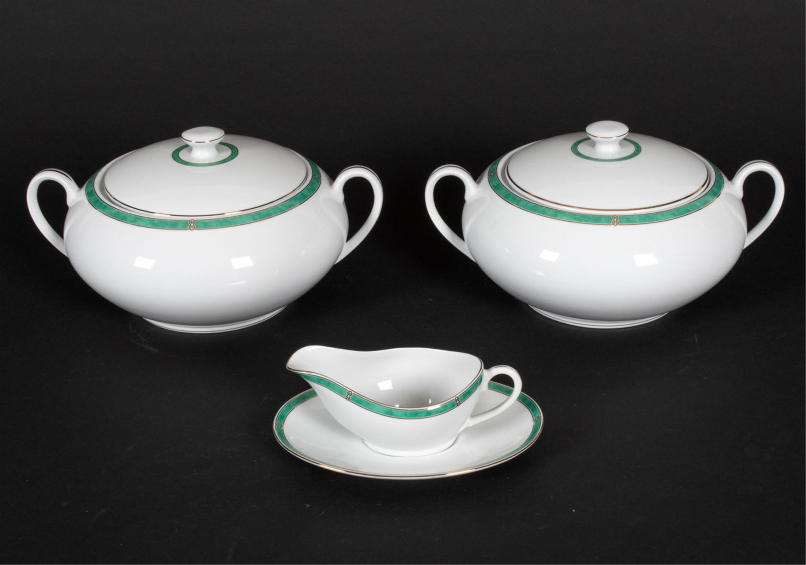CHRISTOFLE PORCELAIN "OCEANA GREEN" SERVEWARE: Including (2) covered tureens and (1) gravy boat with underplate. Dimensions: (Tureen) H 7" x W 13.5" x D 10" Condition: No issues to note.