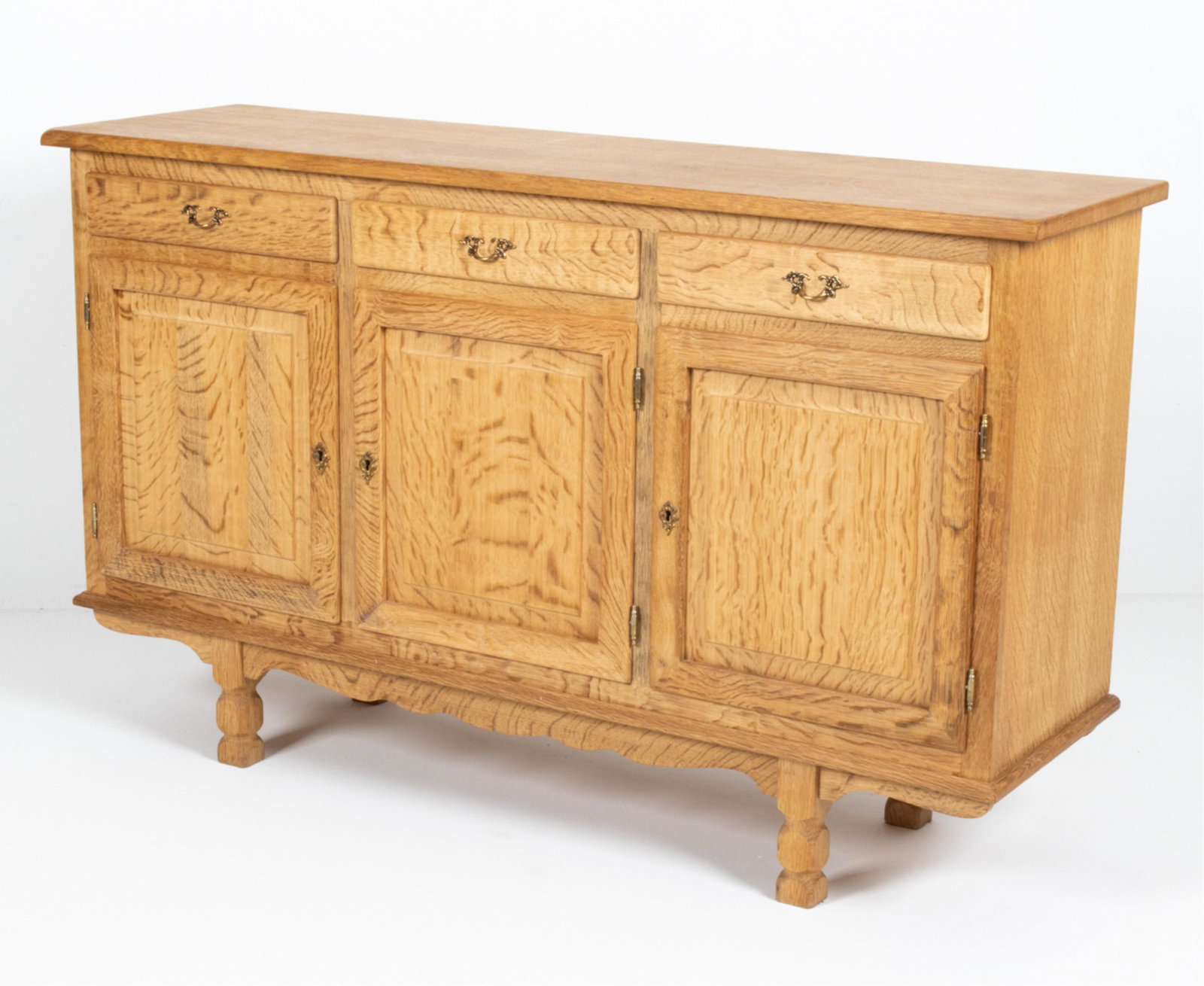 HENNING KJAERNULF DANISH OAK SIDEBOARD: Danish mid-century highboard or tall sideboard in oak. No apparent labels. Dimensions: H 37.25" x W 61.25" x D 18" Condition: Light wear consistent with age and use. C063