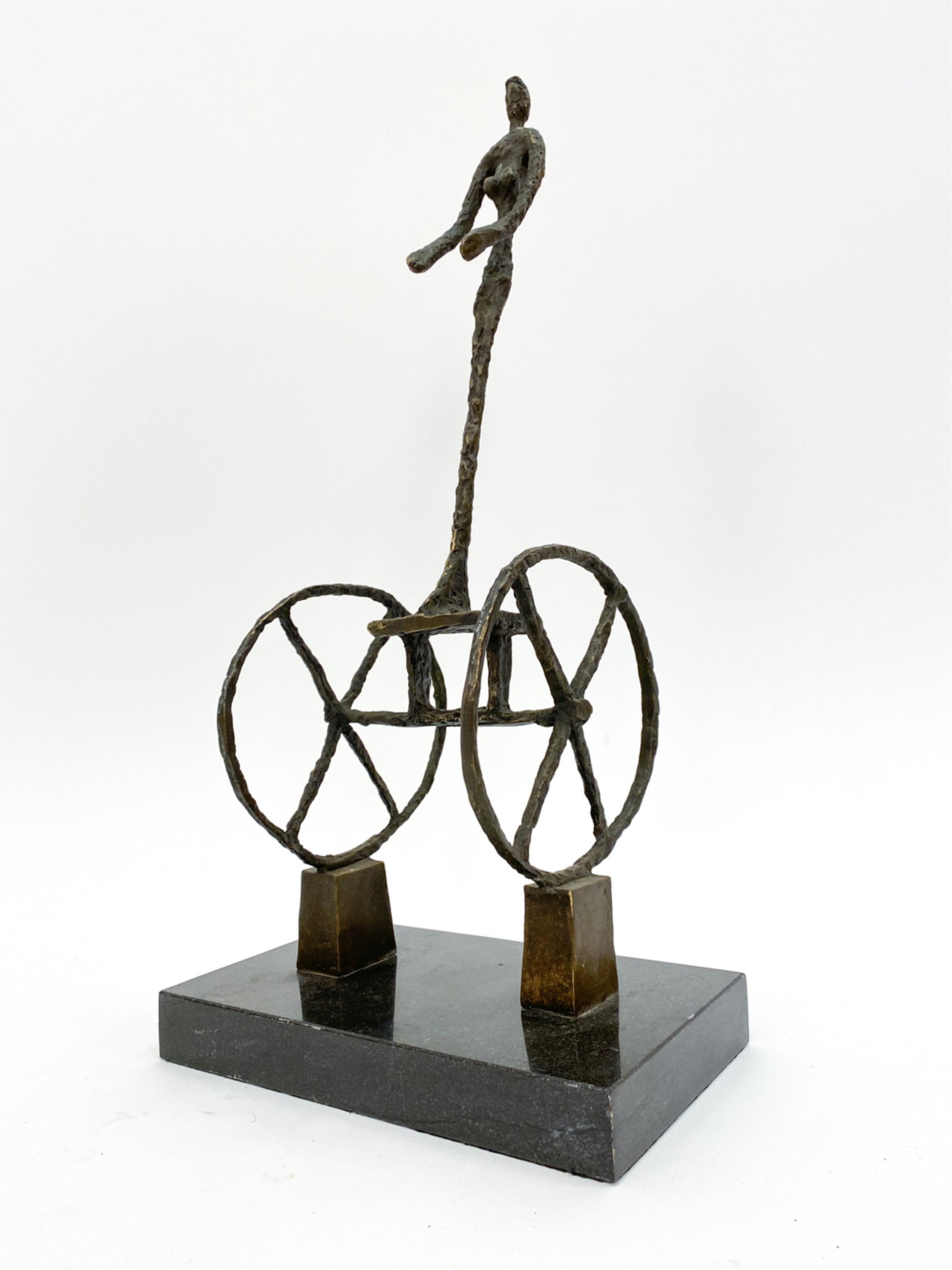 MODERNIST STYLE CHARIOT BRONZE: After Giacometti. Bears signature "Giacometti" by foot.Dimensions: H 18.25" x W 8.75" x D 5.25" Condition: Sculpture with brown patination. Rubbing on edges, few chips to base particularly back corner