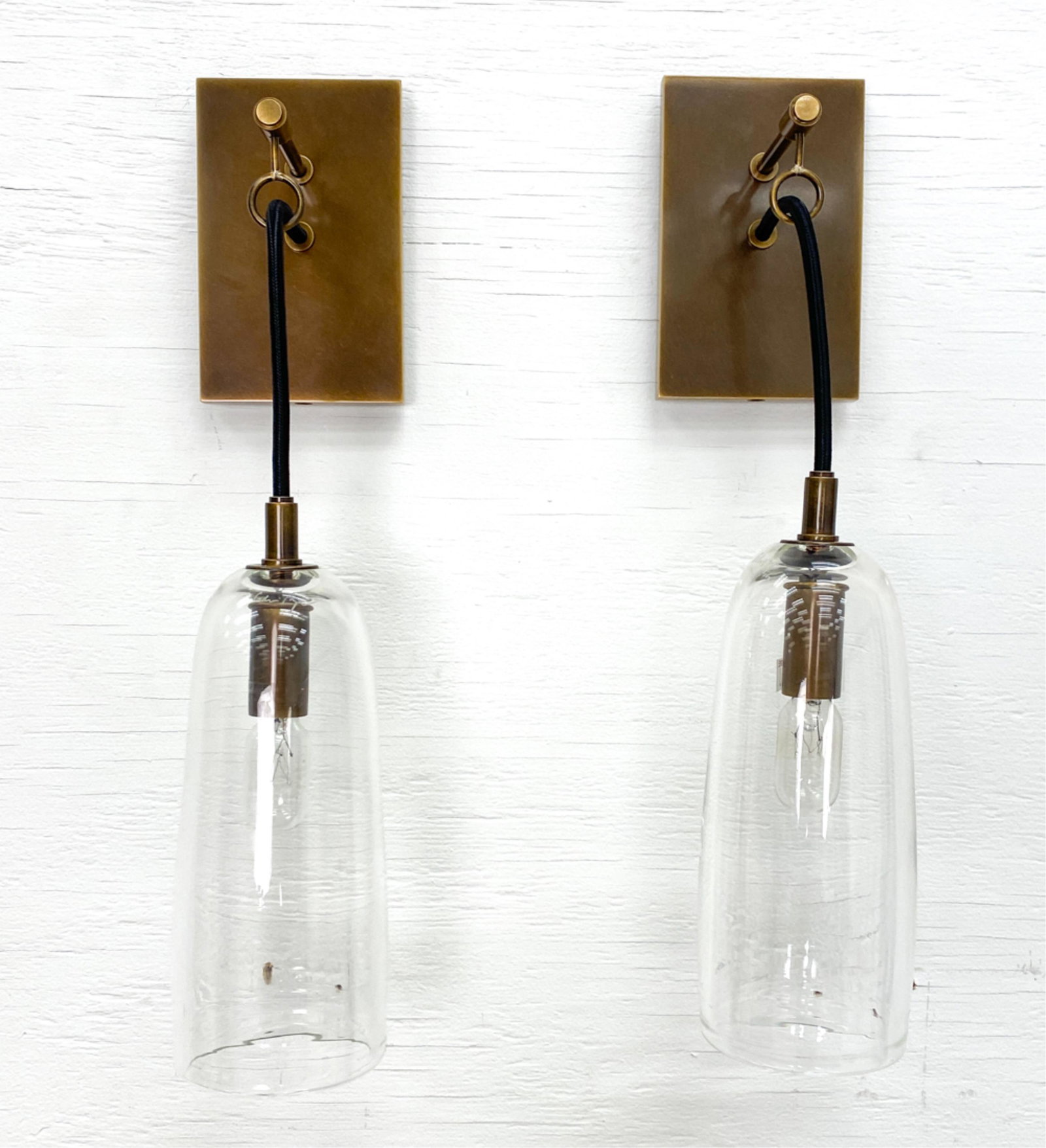 PAIR OF CONTEMPORARY GLASS SHADE WALL SCONCES: No apparent labels. Pendant drop adjustable. Dimensions: (From wall) H 16.5" x W 3.5" x D 5.5" Condition: Very light signs of handling. Untested.