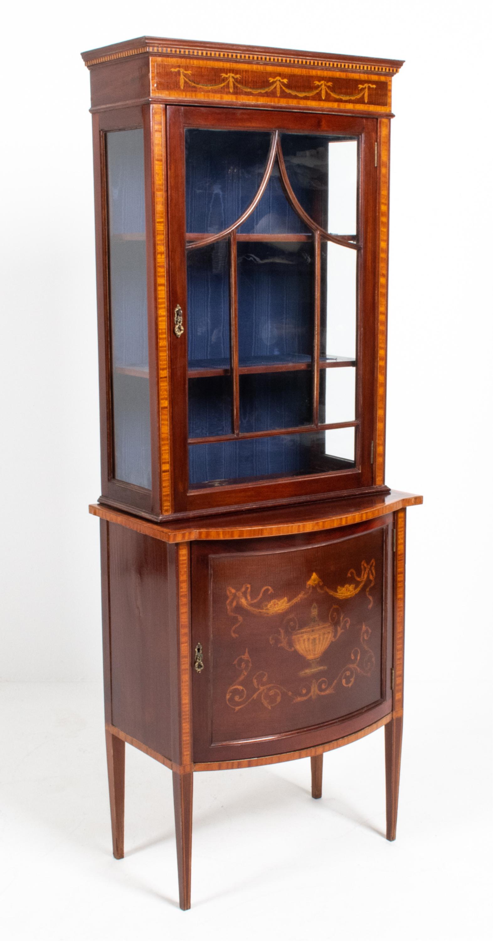 LATE 19TH C. MARQUETRY CURIO CABINET: Keys included. Dimensions: H 71" x W 26" x D 17" Condition: A few splits, chips and small losses to veneer at trim/edges; repair to one piece of inlaid veneer at bottom side edge of cabinet. A couple 