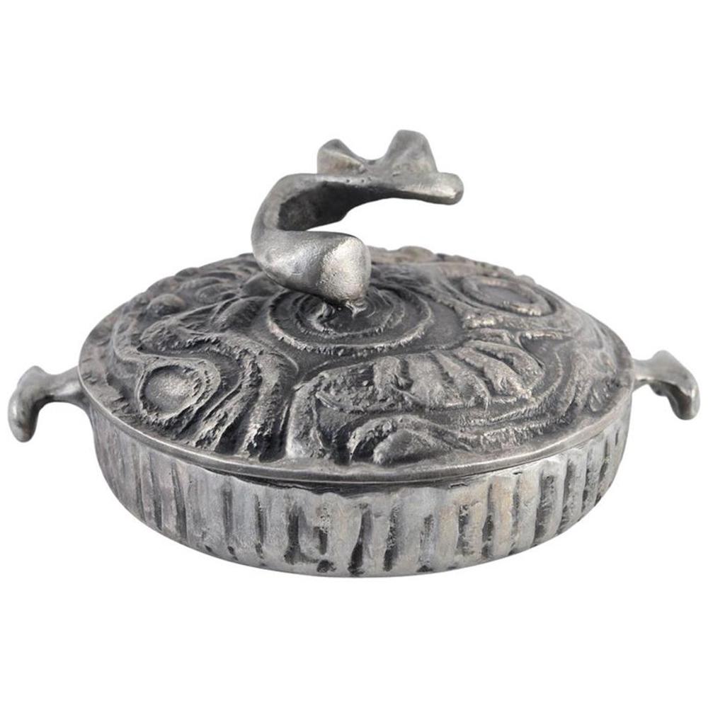 DONALD DRUMM BRUTALIST CASSEROLE DISH, C. 1960S: Both stylish and practical this uncommon 3 quart sand cast aluminum casserole dish by Donald Drumm is sure to make a statement at any event. Signed Drumm on bottom this piece is ready for your use and