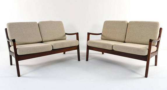 PAIR OLE WANSCHER, P. JEPPESEN "SENATOR" LOVESEATS: From its sculpted paddle-style armrests to the subtle organic lines of its frame, the iconic "Senator" sofa by Ole Wanscher is a masterpiece of Danish Mid-Century design. This example checks all the b