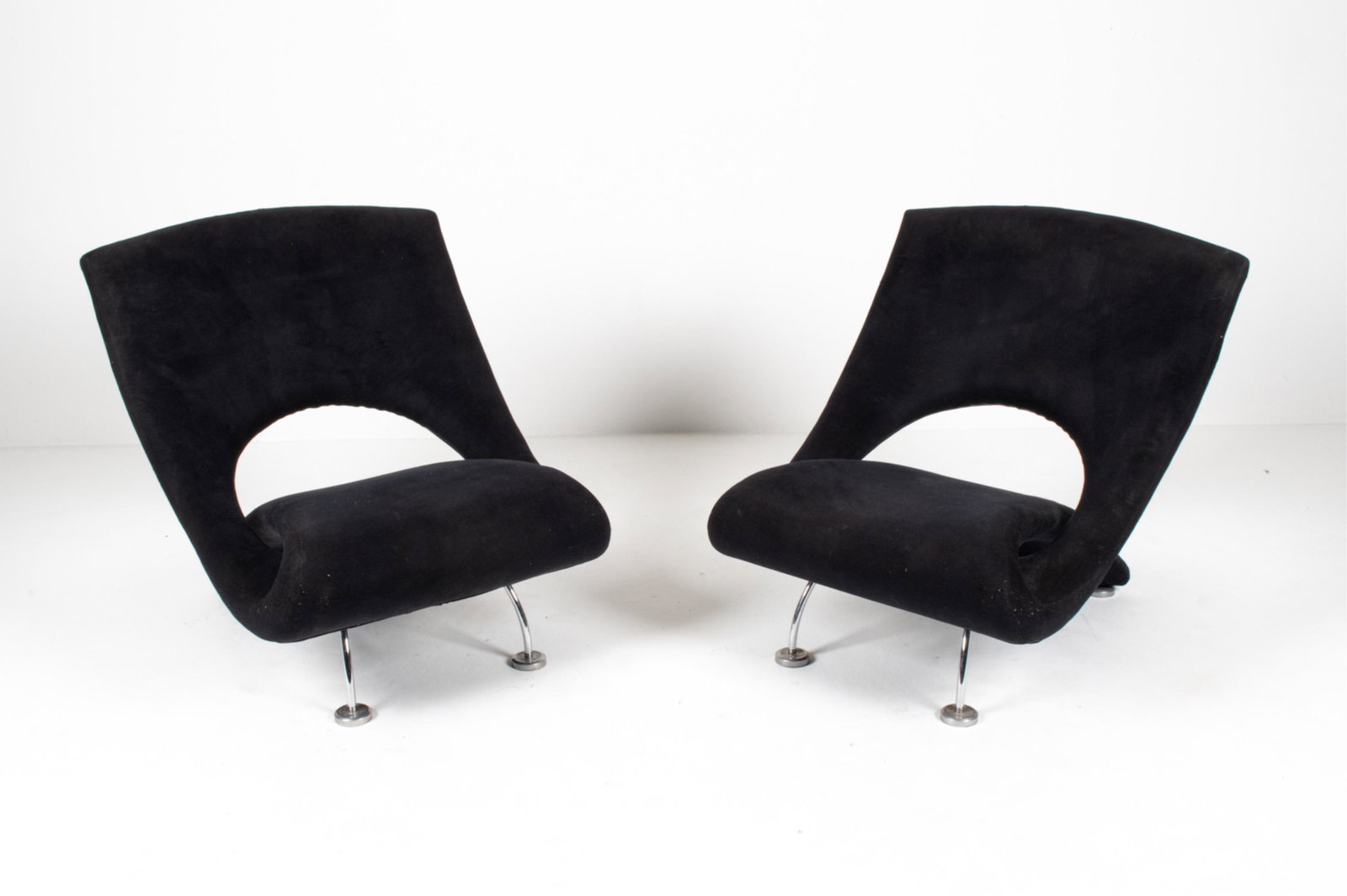 PAIR OF POSTMODERN SCULPTURAL RIBBON CHAIRS: C. Late 20th Century; in the style of Pierre Paulin. Dimensions: H 33" x W 32" x D 32.5" x SH 16.5" Condition: Great candidates for reupholstering! Several small holes/tears to fabric at corners; a fe