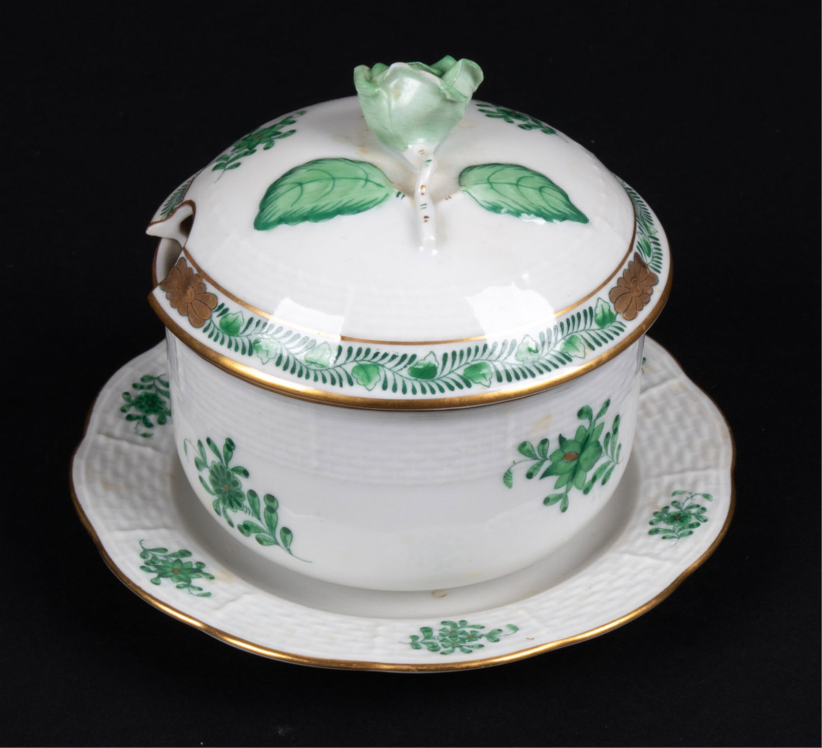 HEREND PORCELAIN CHINESE BOUQUET GREEN SUGAR BOWL: Underplate attached. Dimensions: (Overall) H 4" x Dia. 5" Condition: A few nicks to rose petal finial; a few small spots of discoloration to underside of plate.