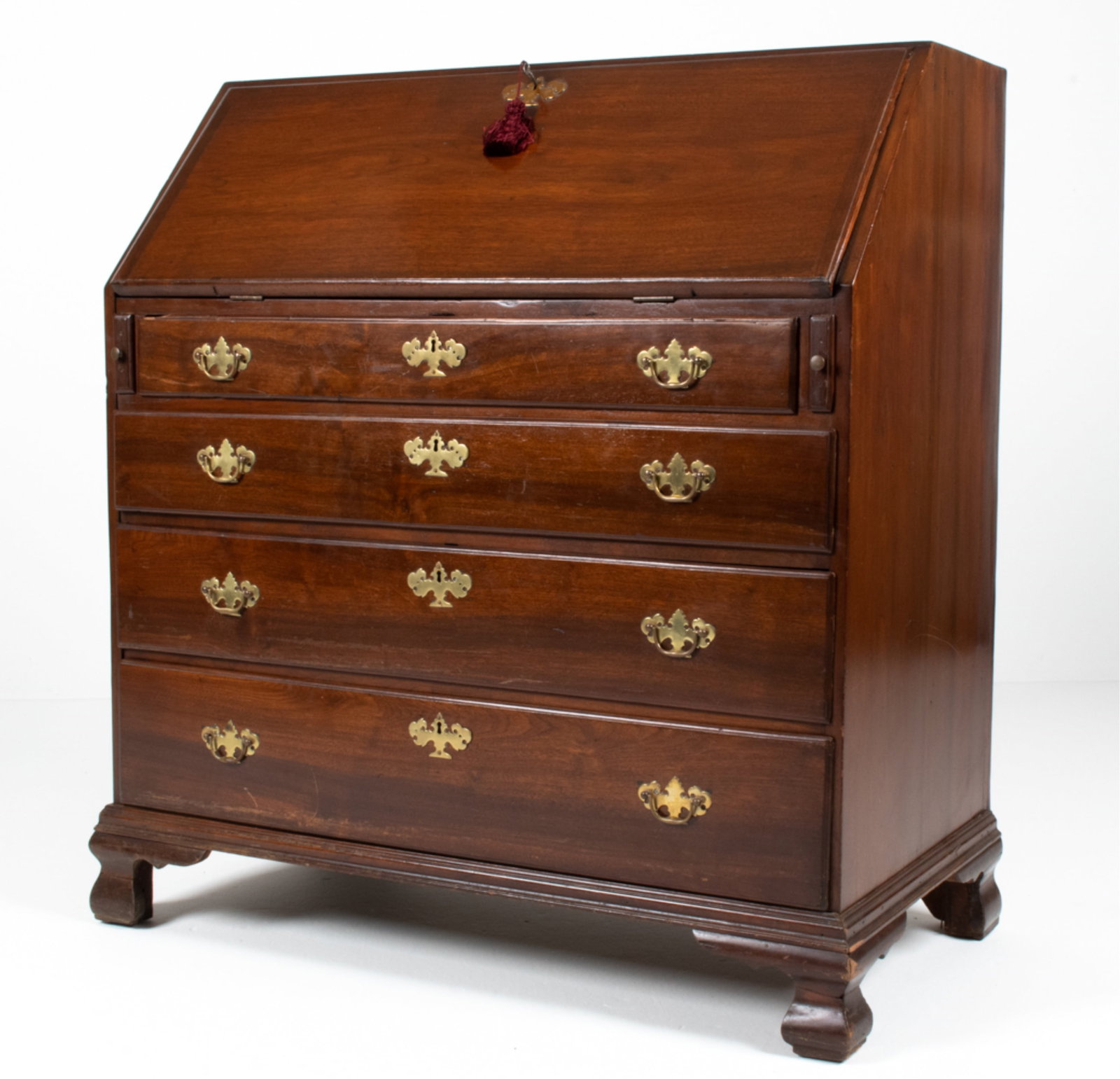 MAHOGANY SLANT-FRONT SECRETARY CHEST: C. Late 18th-Early 19th Century. Key included. Dimensions: (Secretary closed) H 43.5" x W 41.5" x D 22" Condition: Old decoupage or stickers affixed to backsplash of desk. Wood previously refinished. 