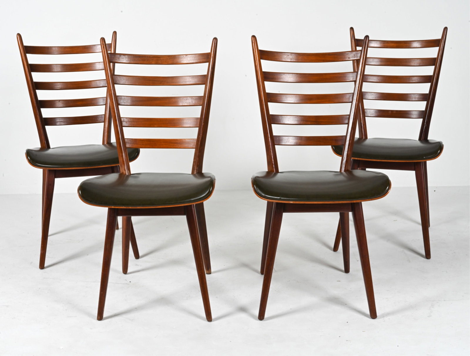 (4) TEAK CHAIRS BY LOUIS VANTEEFFELEN: Unsigned. Dimensions: H 38.5" x W 18.5" x D 20" x SH 18" Condition: Finish wear consistent with age and use including rubs and marks. A few joint repairs. PA032