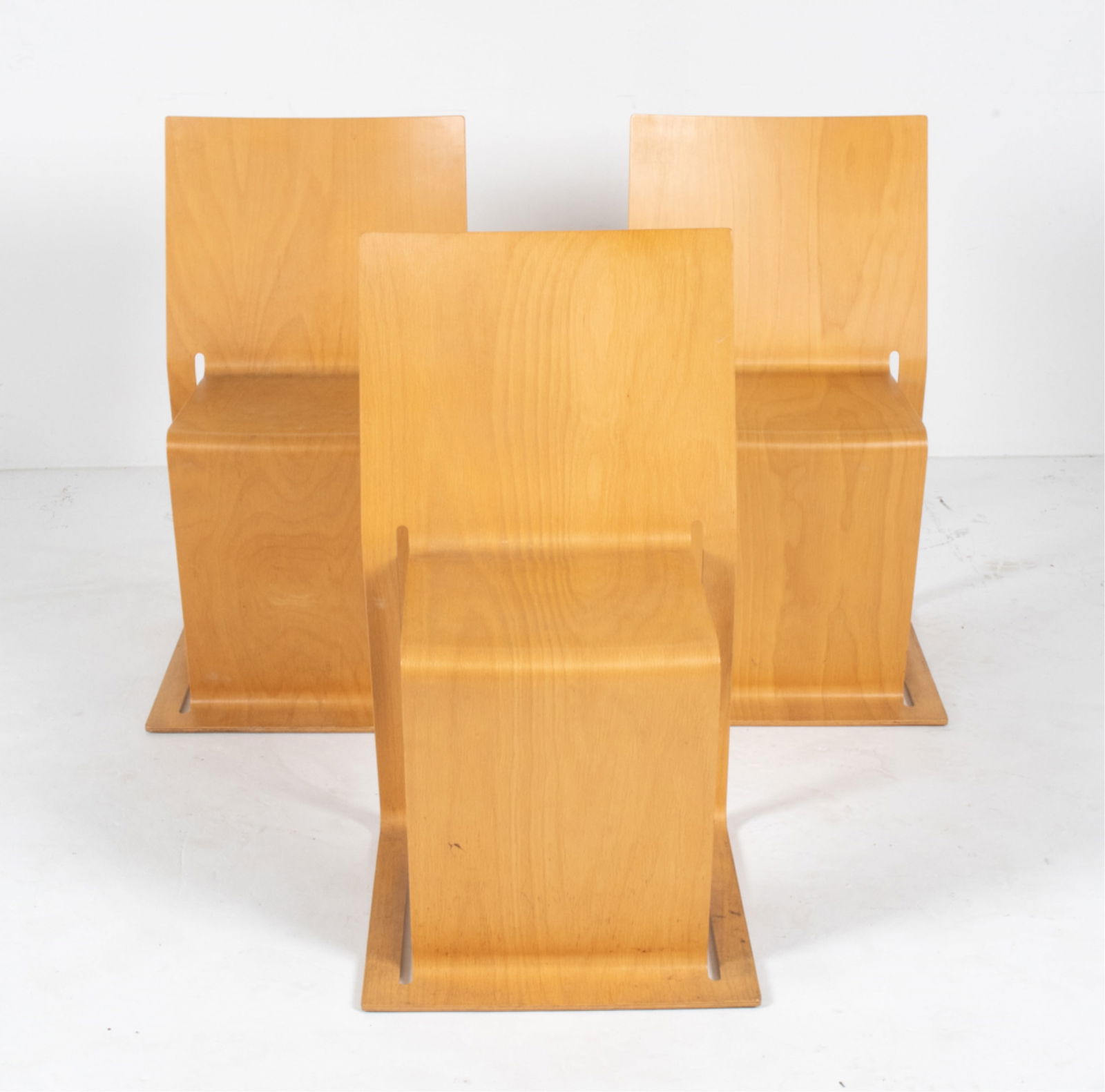 (3) PETER KARPF "VOXIA" MOLDED PLYWOOD CHAIRS: Dimensions: H 33.5" x W 18.25" x D 22.5" x SH 18" Condition: A few small water spots, dings and scuffs; a few marks to wood. Overall light consistent with age.