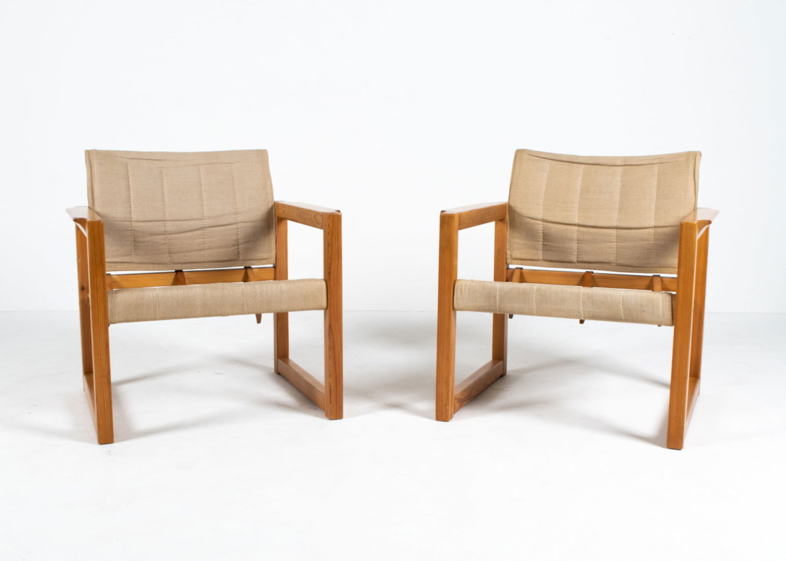PAIR OF KARIN MOBRING PINE SAFARI CHAIRS, 1970'S: Karin Mobring for Ikea, c. 1970's. Dimensions: H 27.5" x W 26.5" x D 26" x SH 14.75" Condition: In very good vintage condition overall; frames with a few dings, scuffs and minor water spots; fabric wi