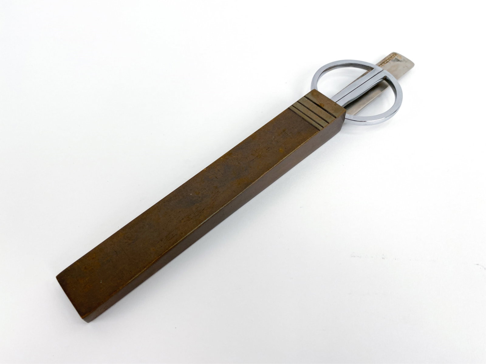 ART DECO LETTER OPENER AND SCISSORS: Unsigned. Dimensions: H 0.75" x W 11" x D 2.5" Condition: Showing normal wear consistent with age and use.