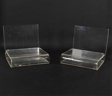 PAIR GARY GUTTERMAN LUCITE LOUNGE CHAIRS: A very unusual pair of low bent lucite lounge chairs - possibly prototypes - in the manner of Spiros Zakas or Maarten Van Severen for Kartell. c. 1970's. Dimensions: H 27" x W 30" x D 32" x SH 8.5" Co