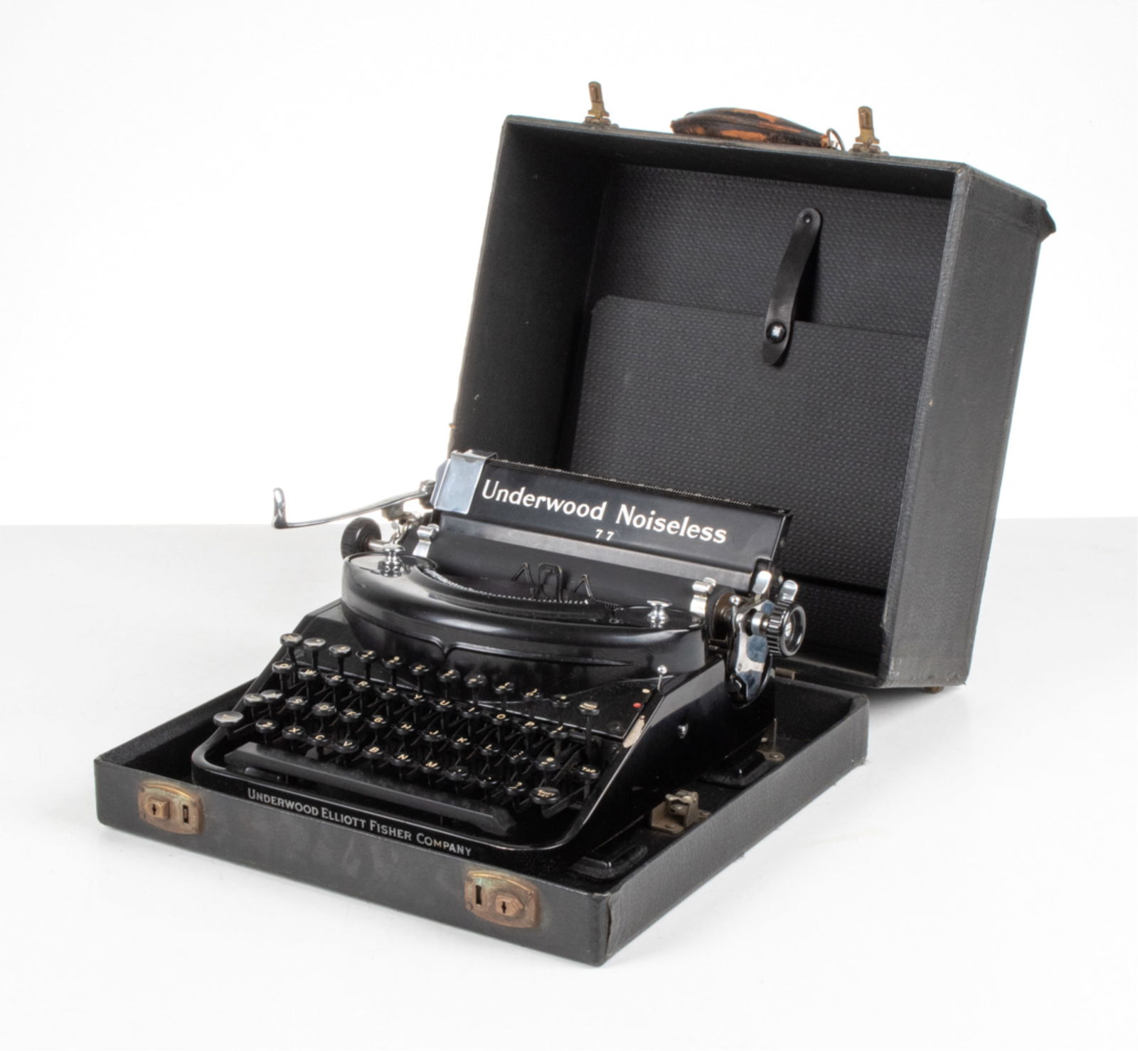 UNDERWOOD ELLIOTT FISHER NOISELESS 77 TYPEWRITER: Dimensions: (Case) H 8" x W 14" x D 13" Condition: Wear consistent with age and use. Not tested.