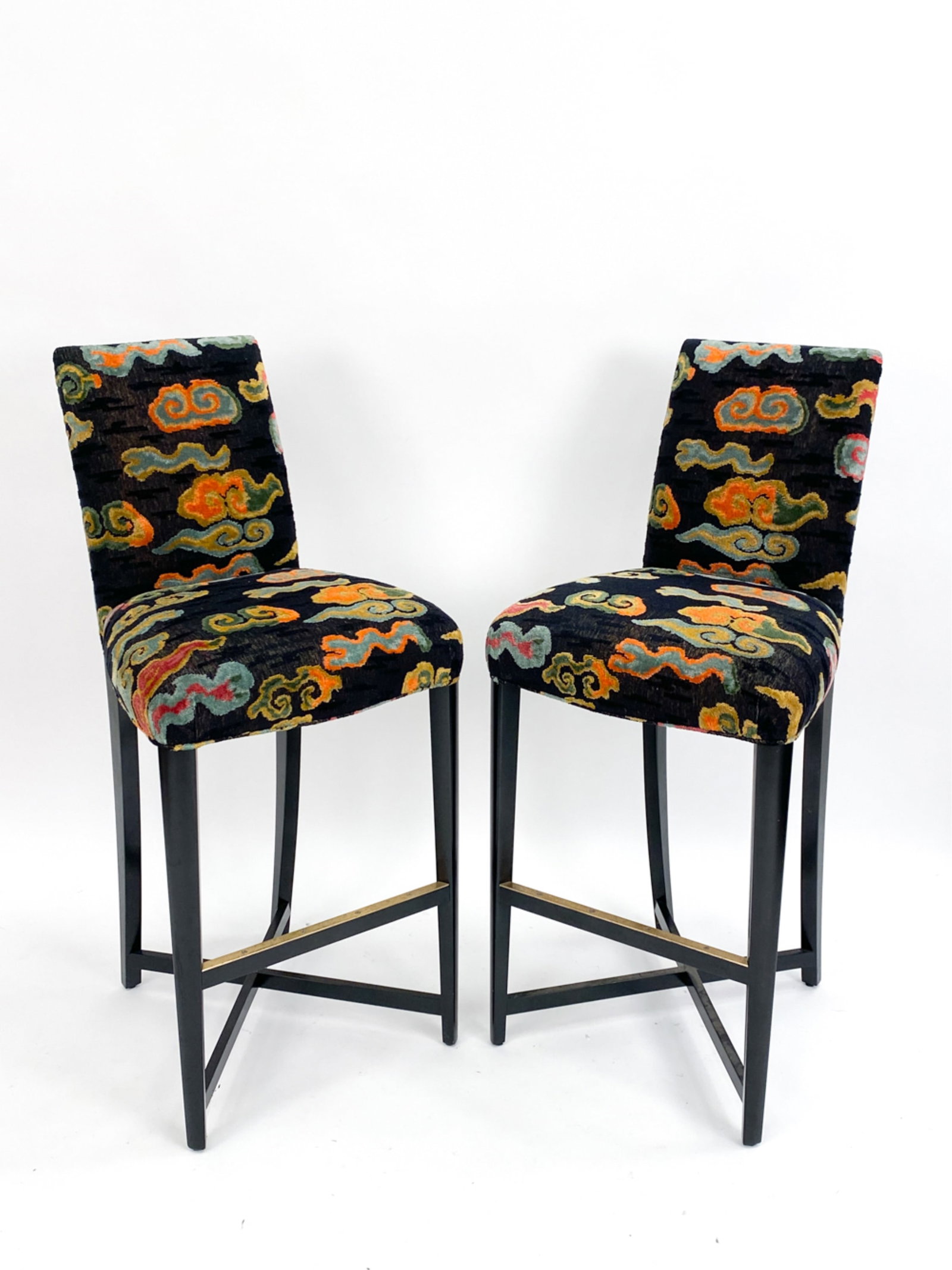 PAIR DONGHIA BAR STOOLS: (2) Donghia bar stools. Wood & upholstery. Label under. Dimensions: H 44.5" x W 20" x D 22" x SH 30.5" Condition: Minor surface wear and scuffs consistent with age and use. Some tarnish and scratches 