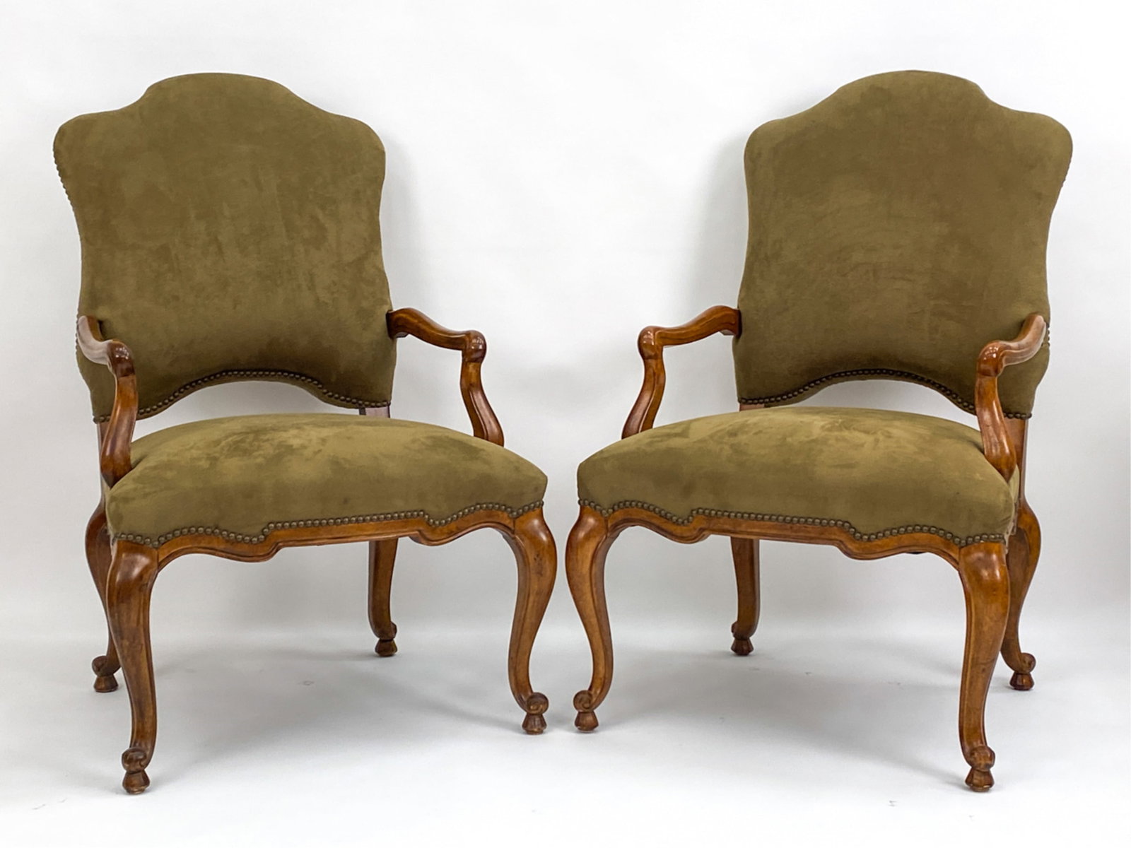 PAIR OF LOUIS XV-STYLE FAUTEUIL ARMCHAIRS: Walnut with tacked velour upholstery. Dimensions: H 44" x W 28" x D 28" x SH 20" Condition: A couple small scuffs.