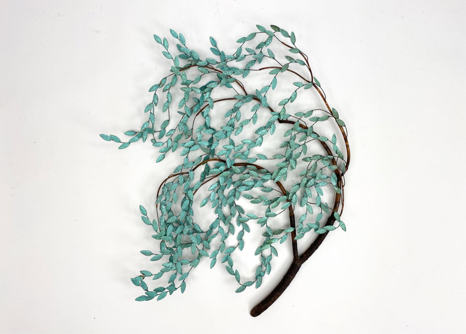 CURTIS JERE-STYLE WILLOW WALL SCULPTURE: Patinated leaves with faux bark stem. Apparently unmarked. Dimensions: H 38" x W 27" x D 3" Condition: A few possible small bends. No apparent losses.