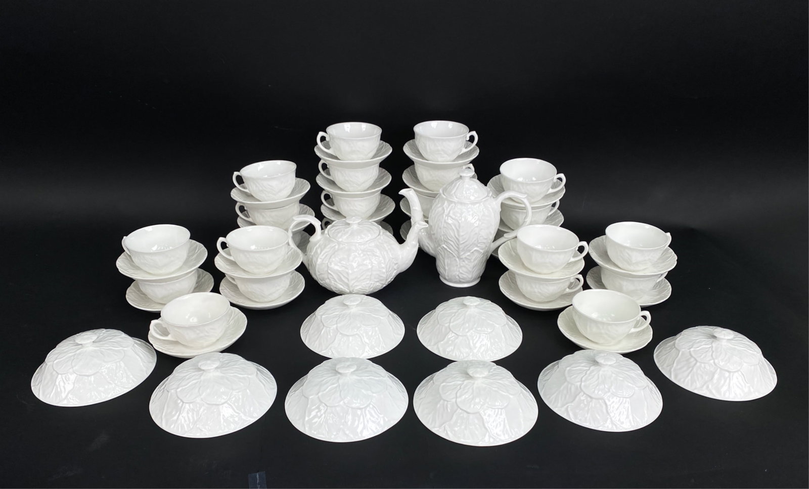 COALPORT COUNTRYWARE ENGLISH BONE CHINA SERVICE: Marked underneath. Including teapot, coffee pot, (24) cups and saucers, (8) lids. Dimensions: (Coffee pot) H 8.5" x W 8.5" x D 4.5" Condition: No noticeable damage; possible flea bites, use wear.