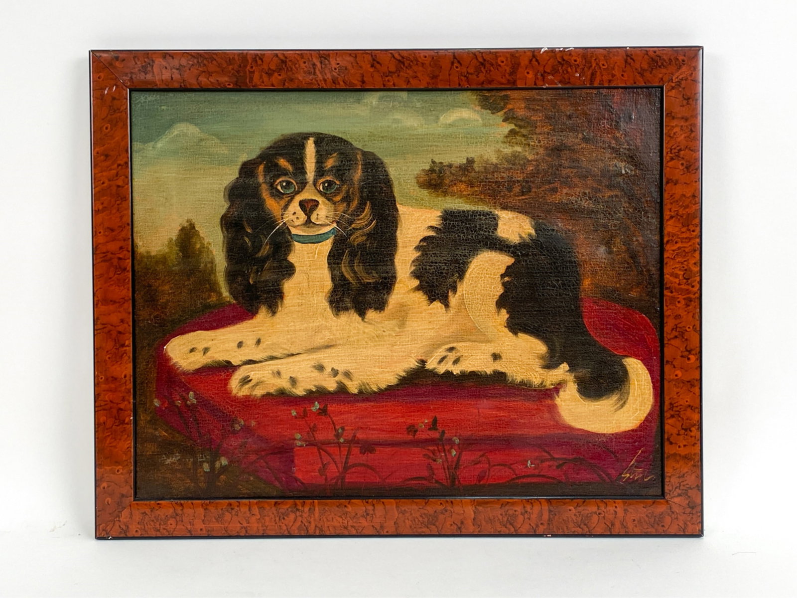 CONTEMPORARY PRIMITIVE-STYLE SPANIEL PAINTING: Oil on canvas. Signed lower right. Faux aged surface. Dimensions: (Frame) H 16.25" x W 20.5" (Canvas) H 14" x W 18.25" Condition: Canvas indent upper right. Chipping to edges of frame.
