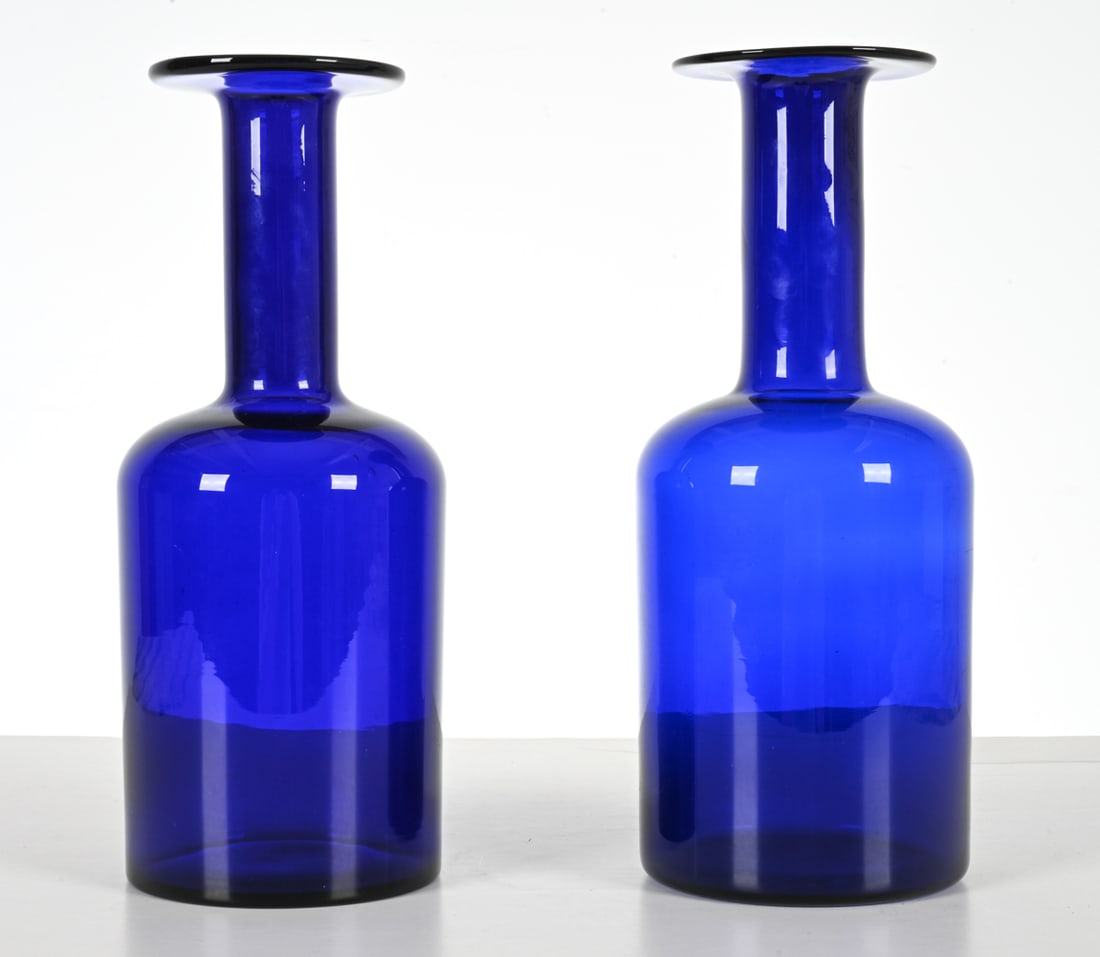 PAIR OTTO BRAUER FOR HOLMEGAARD COBALT GLASS VASES: Dimensions: H 11.75" x Dia. 4.75" Condition: No issues to note; no signs of chips, cracks or repairs. E196