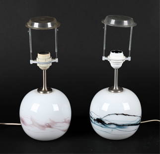 (2) MICHAEL BANG FOR HOLMEGAARD "SAKURA" LAMPS: (2) Scandinavian Modern "Sakura" table lamps in cased opal glass with abstract colorful swirls, designed by Michael Bang for Holmegaard, c. 1980's. Dimensions: H (to top of socket) 12" x Dia. 6.25" Co