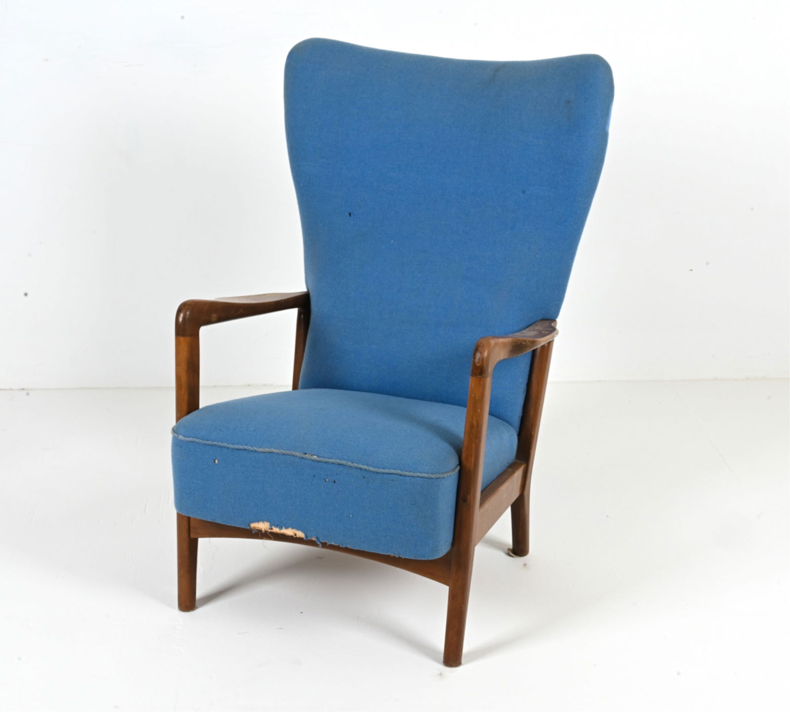 SOREN HANSEN FOR FRITZ HANSEN WINGBACK EASY CHAIR: Danish Mid-Century high-back lounge chair with open armrests of sculpted beech wood; designed by Soren Hansen for Fritz Hansen, c. 1950's-1960's. Dimensions: H 39" x W 27.5" x D 32" x SH 16" Condition