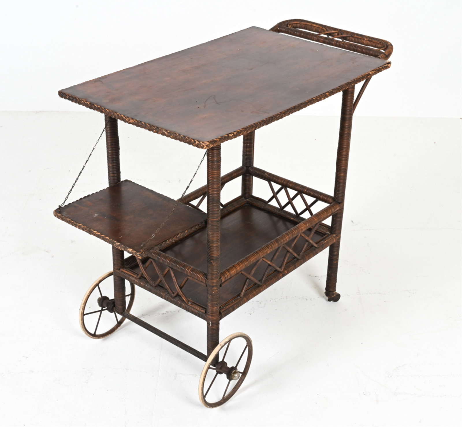 DANISH 1950'S RATTAN & WOOD BAR OR TEA CART: Dimensions: (Shelf folded up) H 27.5" x W 35" x D 17" Condition: Scratches and scuffs, a few finish losses and small water spots. Some wear to front wheels. A couple small breaks to rattan wrap. E160