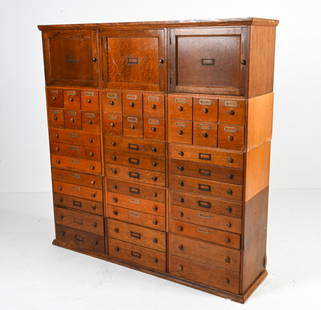 ANTIQUE OAK MODULAR FILE OR CARD CABINET: Dimensions: (Overall) H 63.5" x W 61.25" x D 16" Condition: As-is; great candidate for restoration. Splits, separation, chips, and losses to veneer at sides, surface wear and finish losses