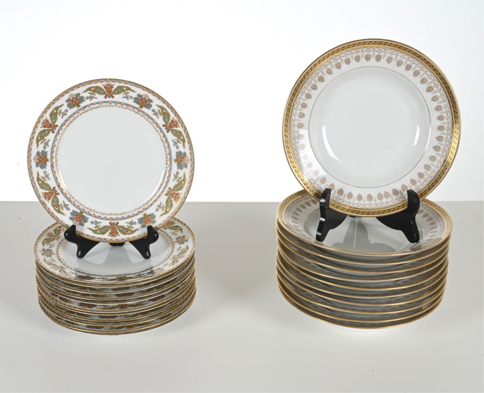 GROUPING OF LIMOGES PORCELAIN: Includes: (11) Bernardaud soup bowls and (12) GDA salad plates. Dimensions: (Soup bowl) H 1.75" x Dia. 9.25" Condition: Small nicks to (2) salad plates; chip to one soup bowl. Rubbing and minor losses