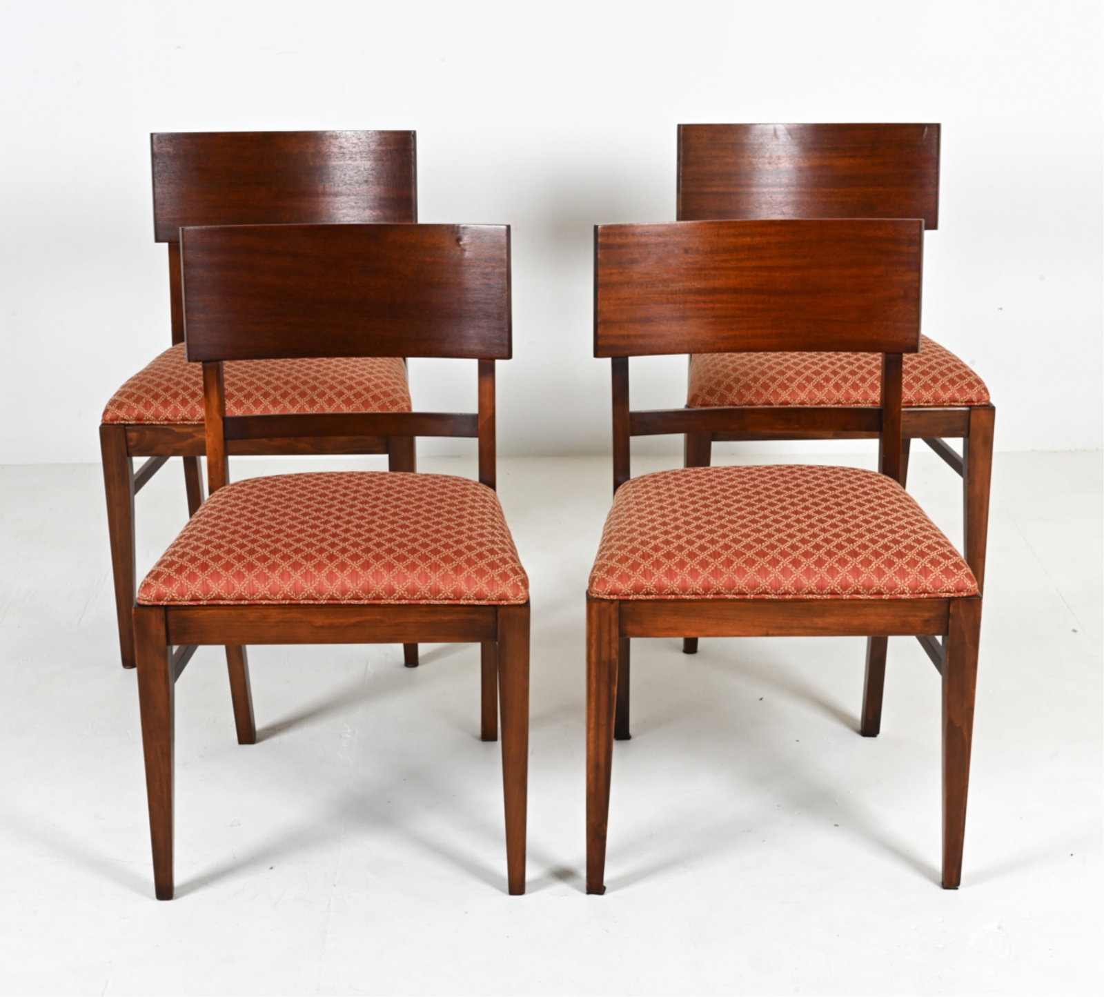 (4) MID-CENTURY MAHOGANY DINING CHAIRS: Mahogany finish. Dimensions: H 32" x W 20" x D 20" x SH 18.5" Condition: Minor scratches and dings. Minor wear to fabric.
